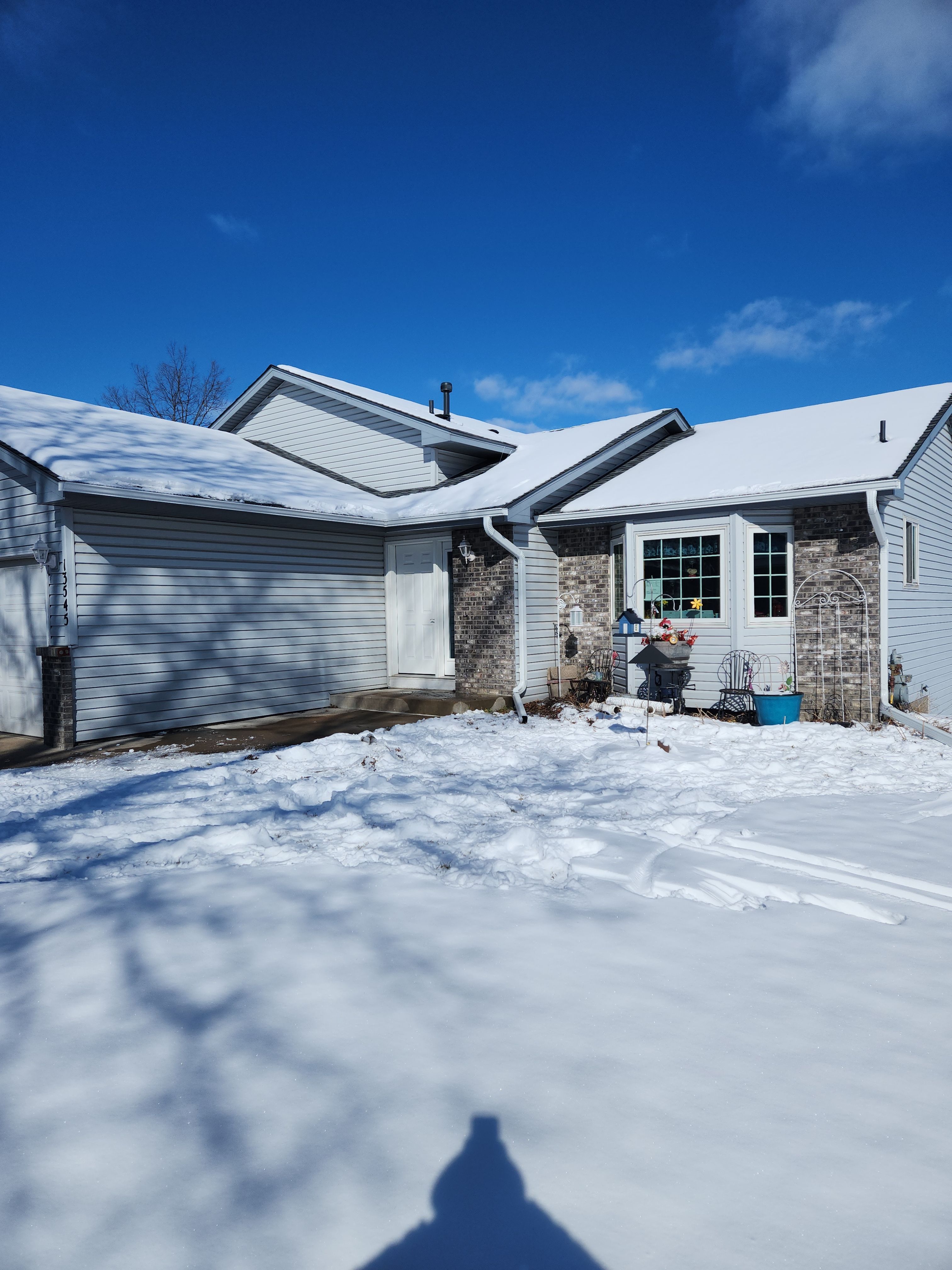 5" Gutters in Hugo by Next Level Seamless Gutters / Exteriors Inc.