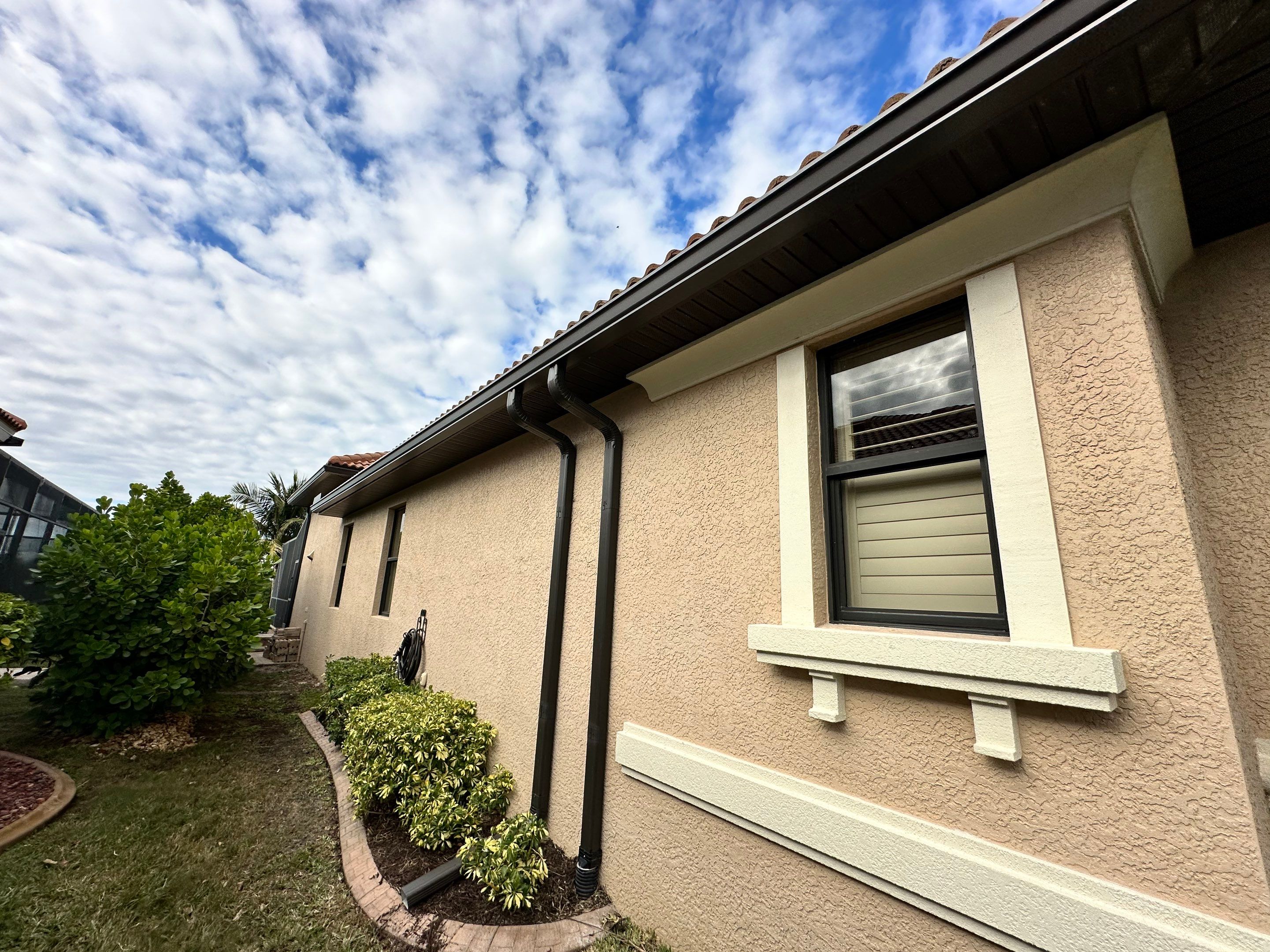 Bronze Downspout Installation in Cape Coral FL by Gutter Professors
