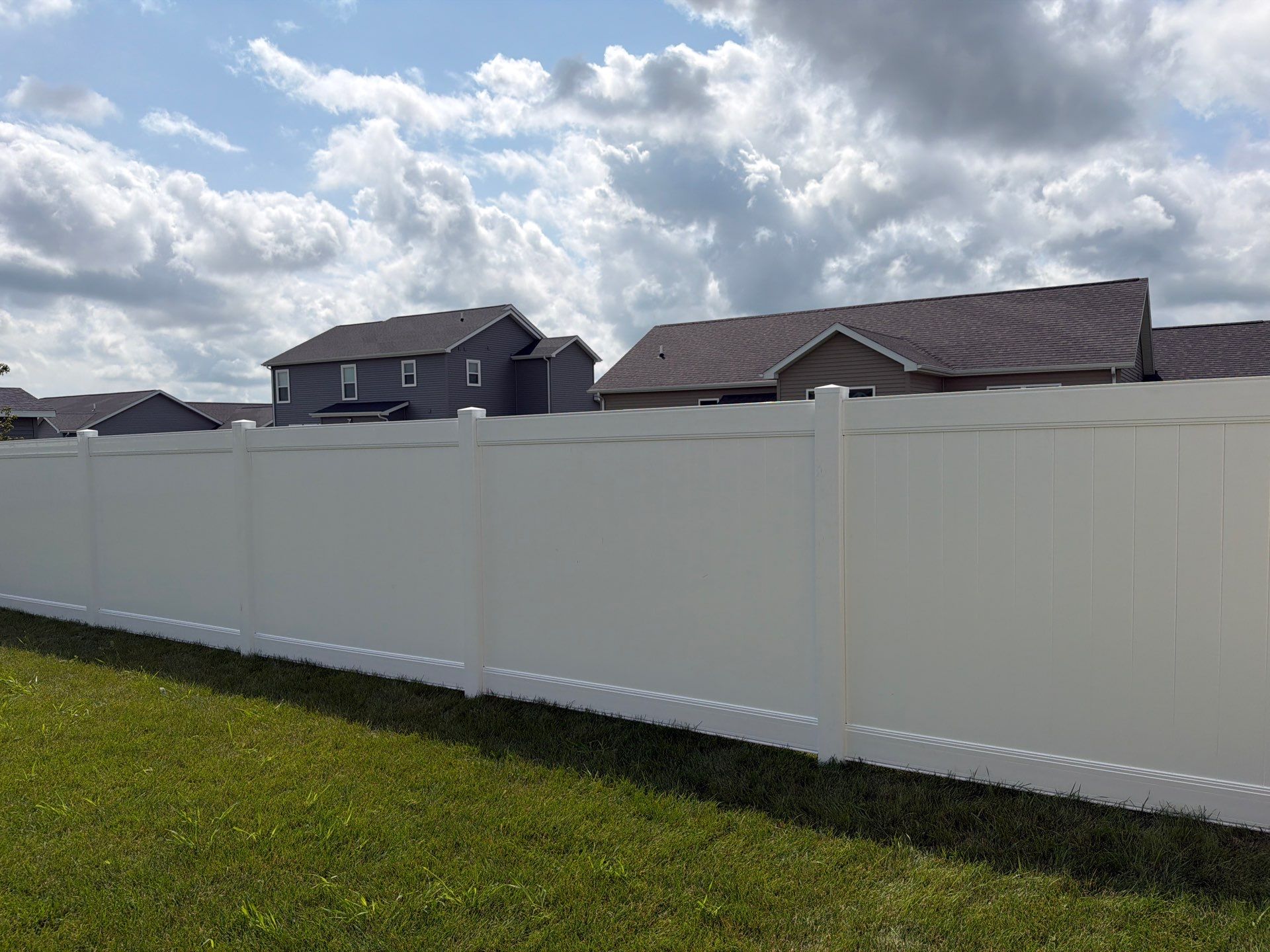New Vinyl Privacy Fencing and Gates for Waterloo Residential Backyard by Perfect Picket Fence and Stain