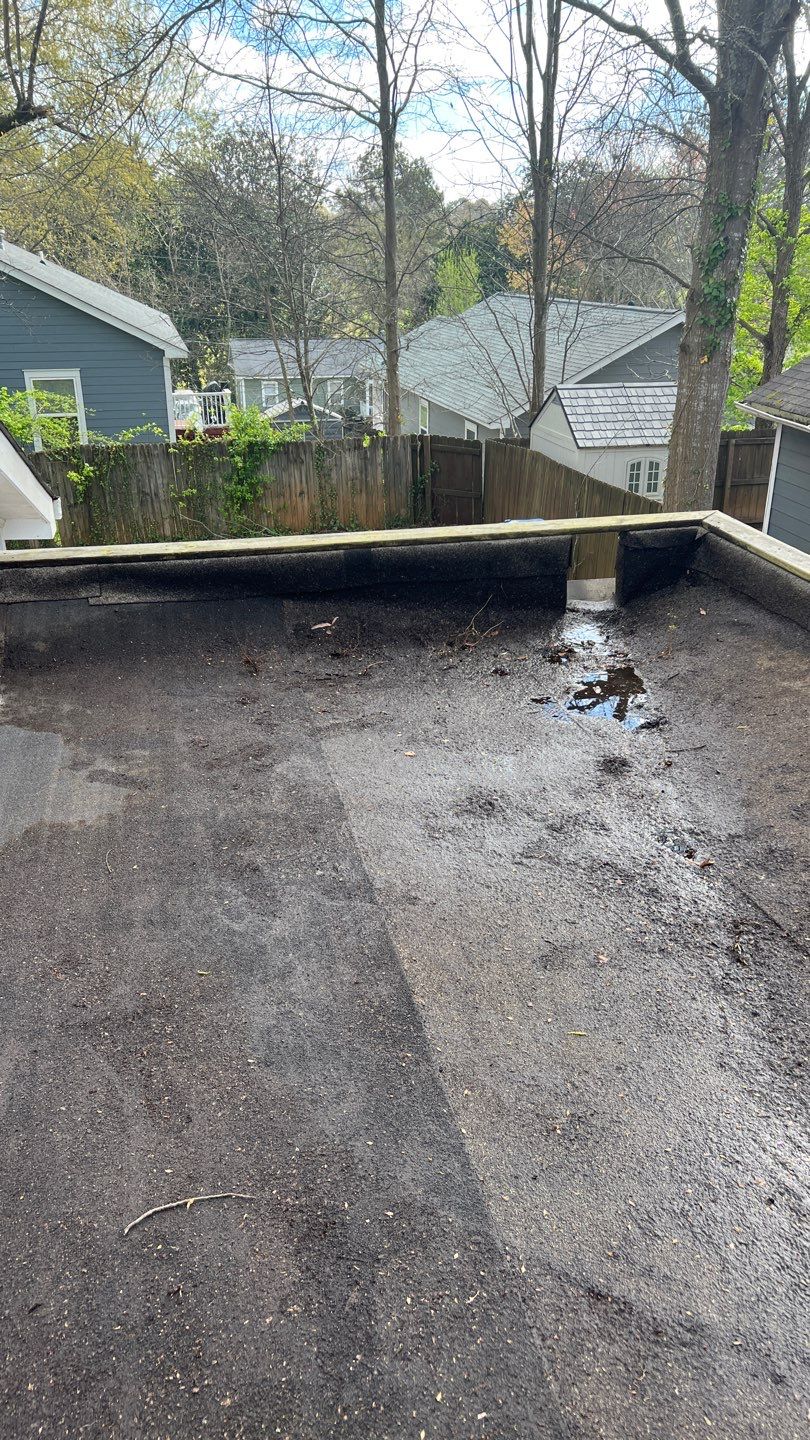 Gutter Cleaning using brown bags by Roof Bullies