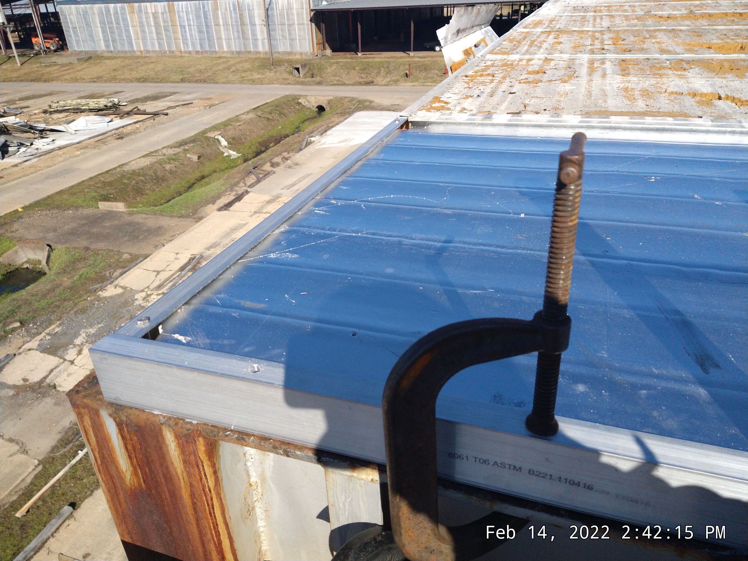 Commercial Roofing Installation using Aluminum Roofing panels by Hostetler Roofing