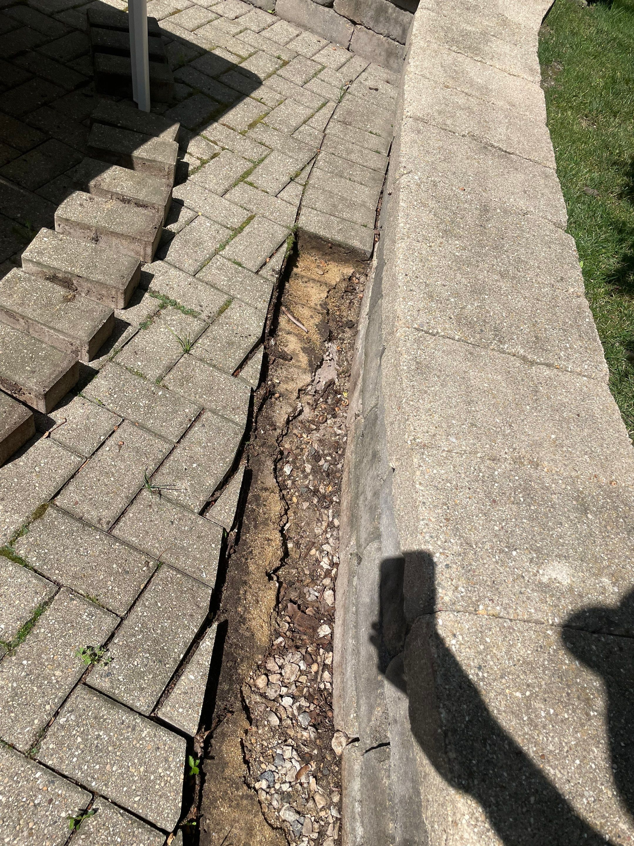 Brick patio repair, clean sand and seal by Northern Power Washing LLC.