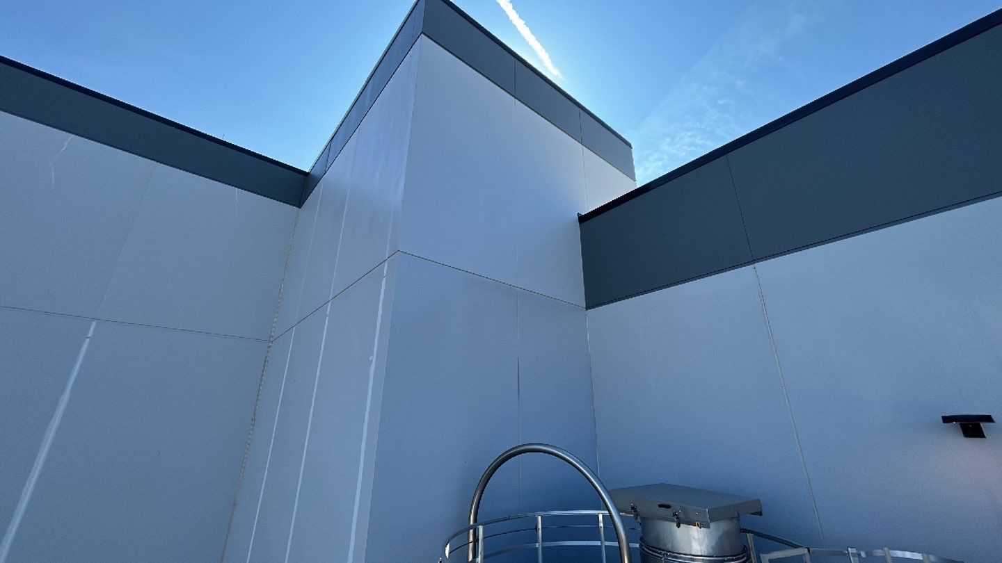 Oil removal using hot water and environmentally friendly degreaser by Northern Power Washing LLC.
