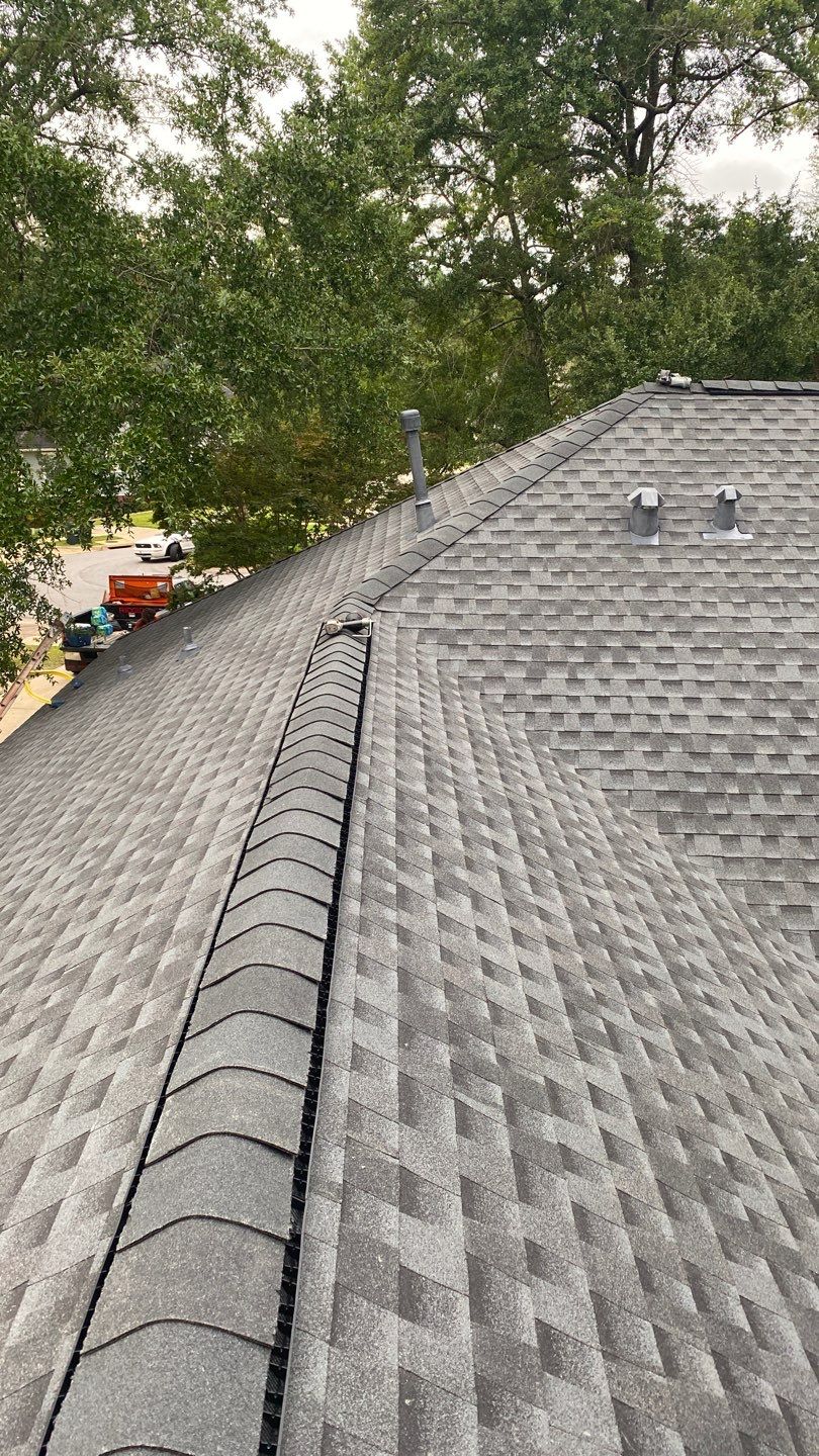 Residential Roofing Installation using Roof Replacement by American Roofing & Construction LLC