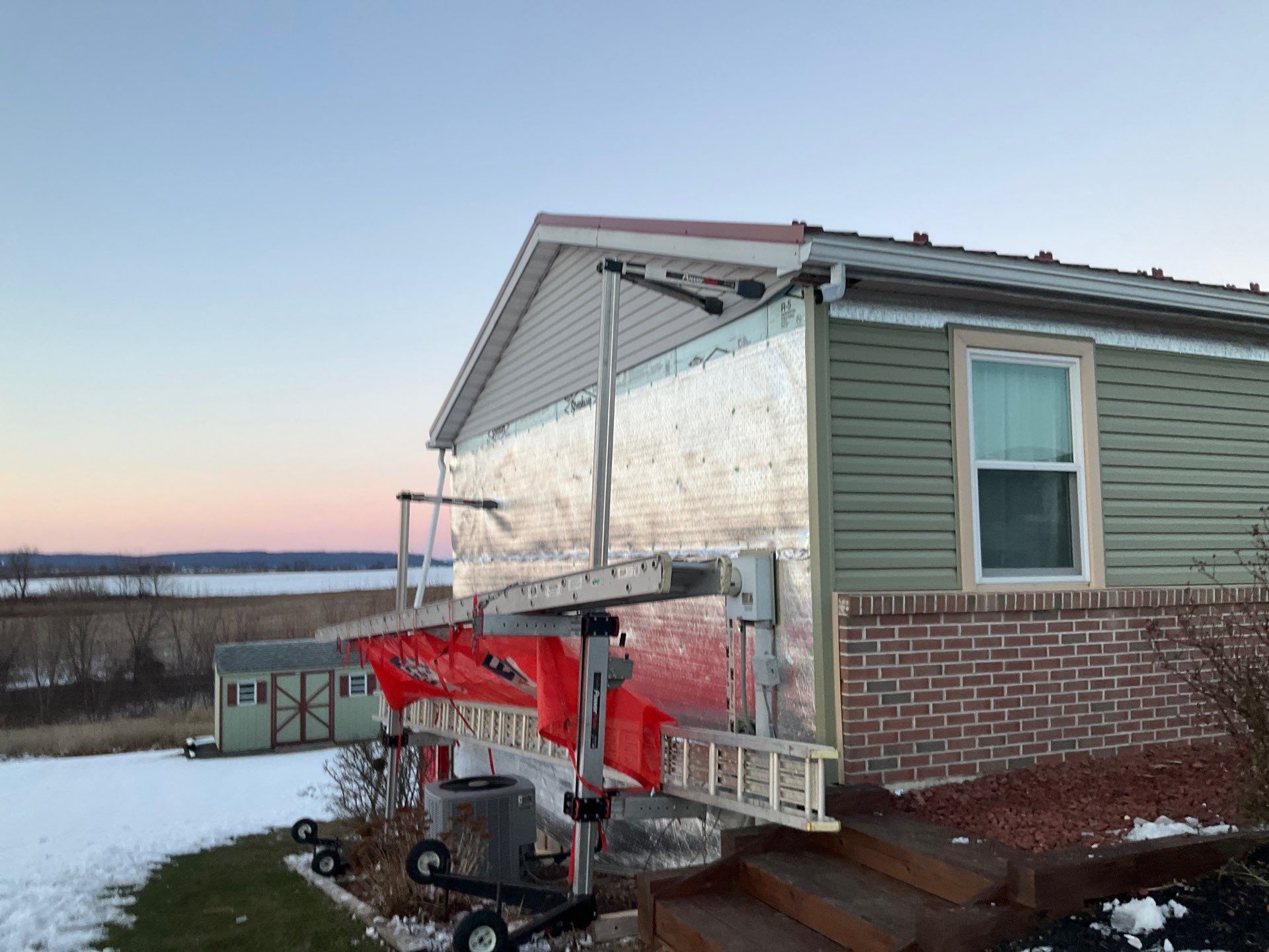 Vinyl Siding Replacement and Patio Door Installation in Elizabethville by Esh Builders