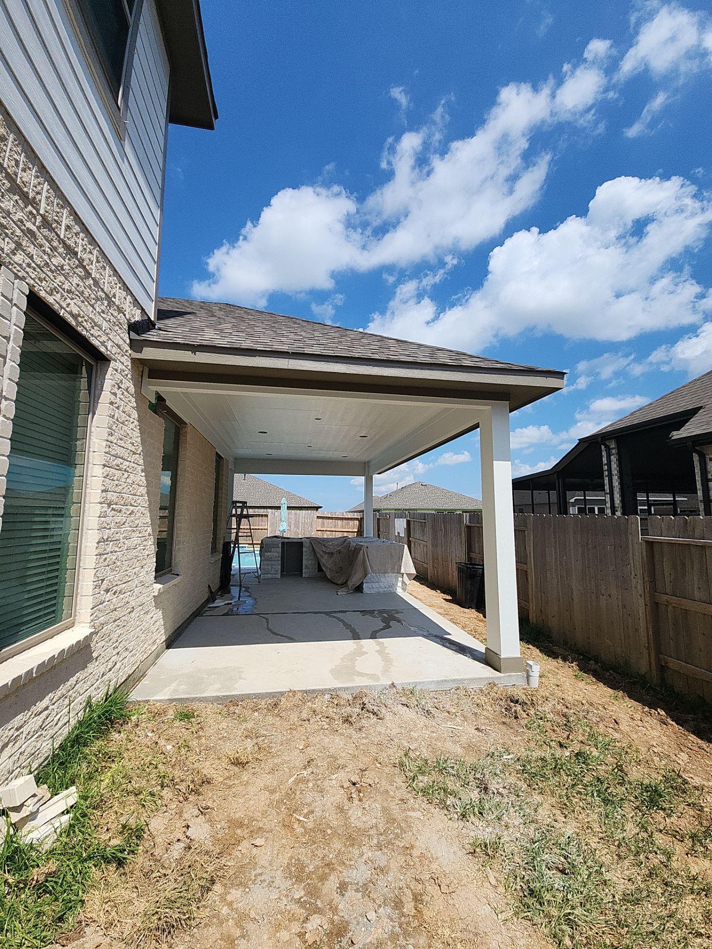 Patio and Summer Kitchen in Texas city by SophAlx LLC