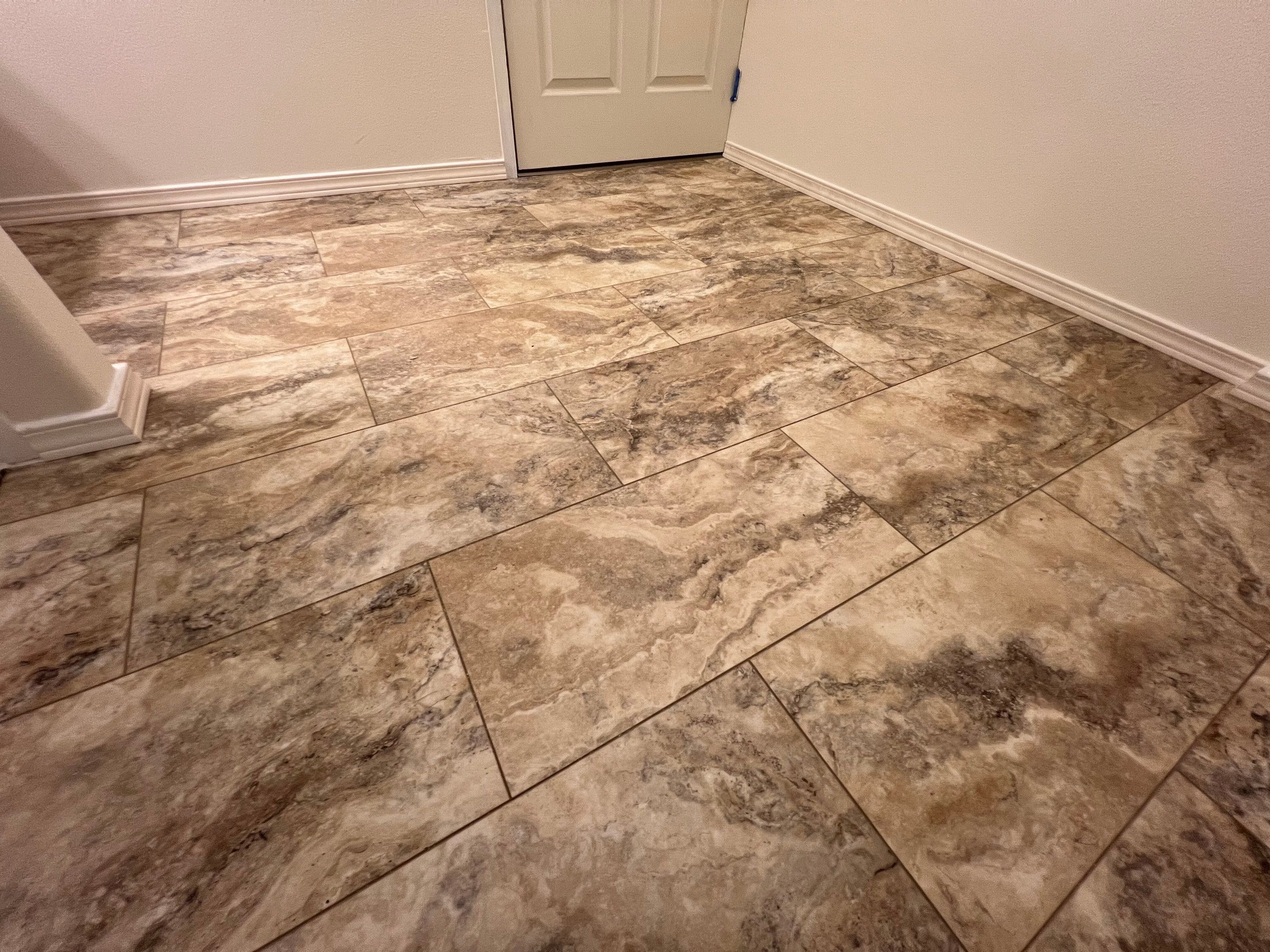 Bathroom flooring upgrade by Handyman State LLC