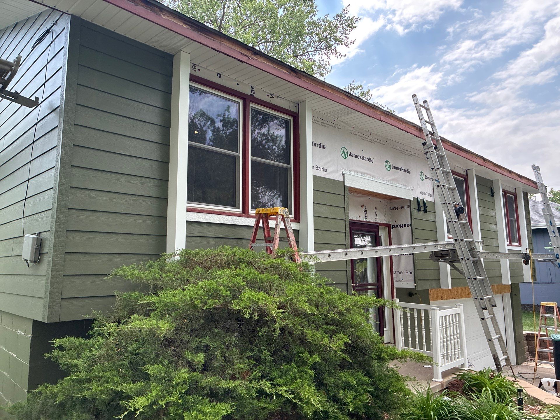 James Hardie Siding Replacement in Omaha with Mountain Sage Finish by Carps Complete Exteriors