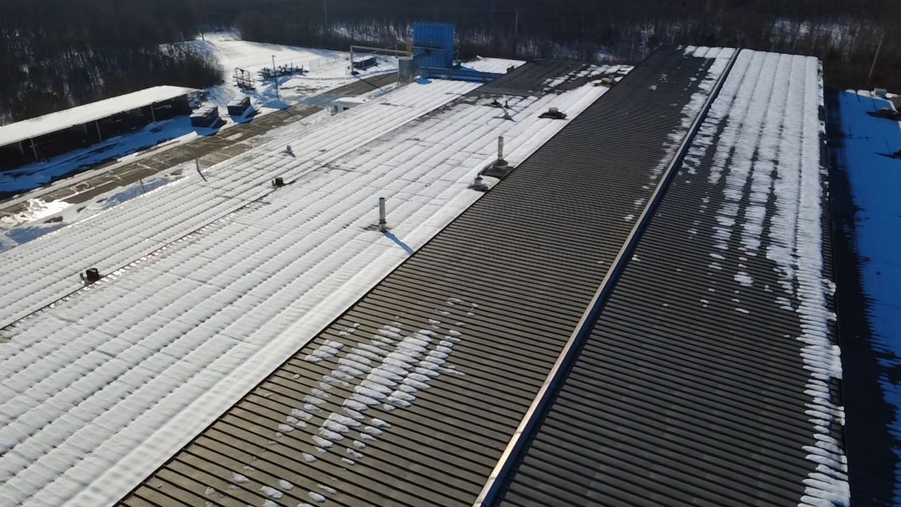 Commercial Metal and Flat Roof Repairs in Mason, Ohio by Level Up Roofing and Restoration Services LLC
