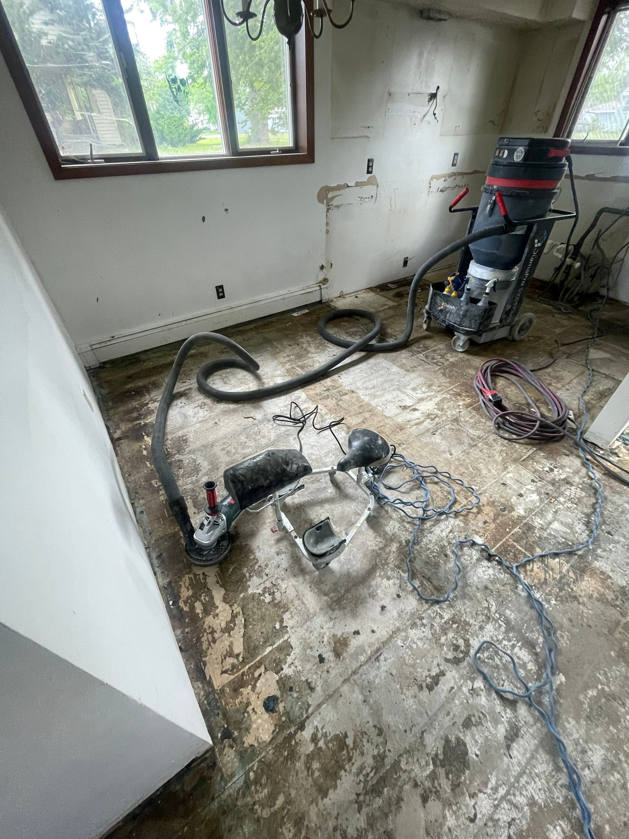 Commercial Subfloor Preparation and Flooring Restoration in Sioux Falls by Select Painting, Coatings & Garage Cabinets