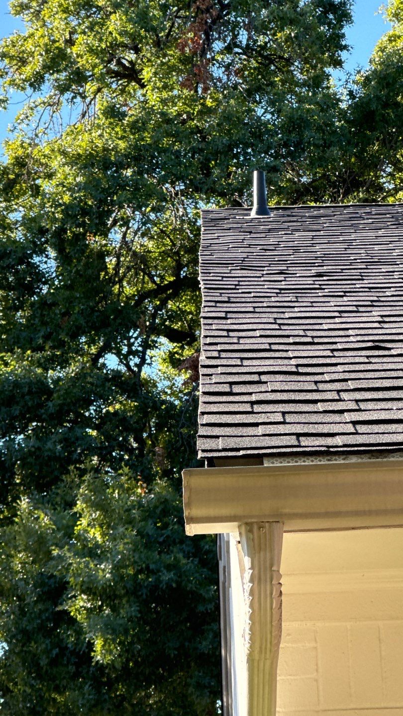 IKO Glacier-White brick house by Tejas Roofworks + Restoration