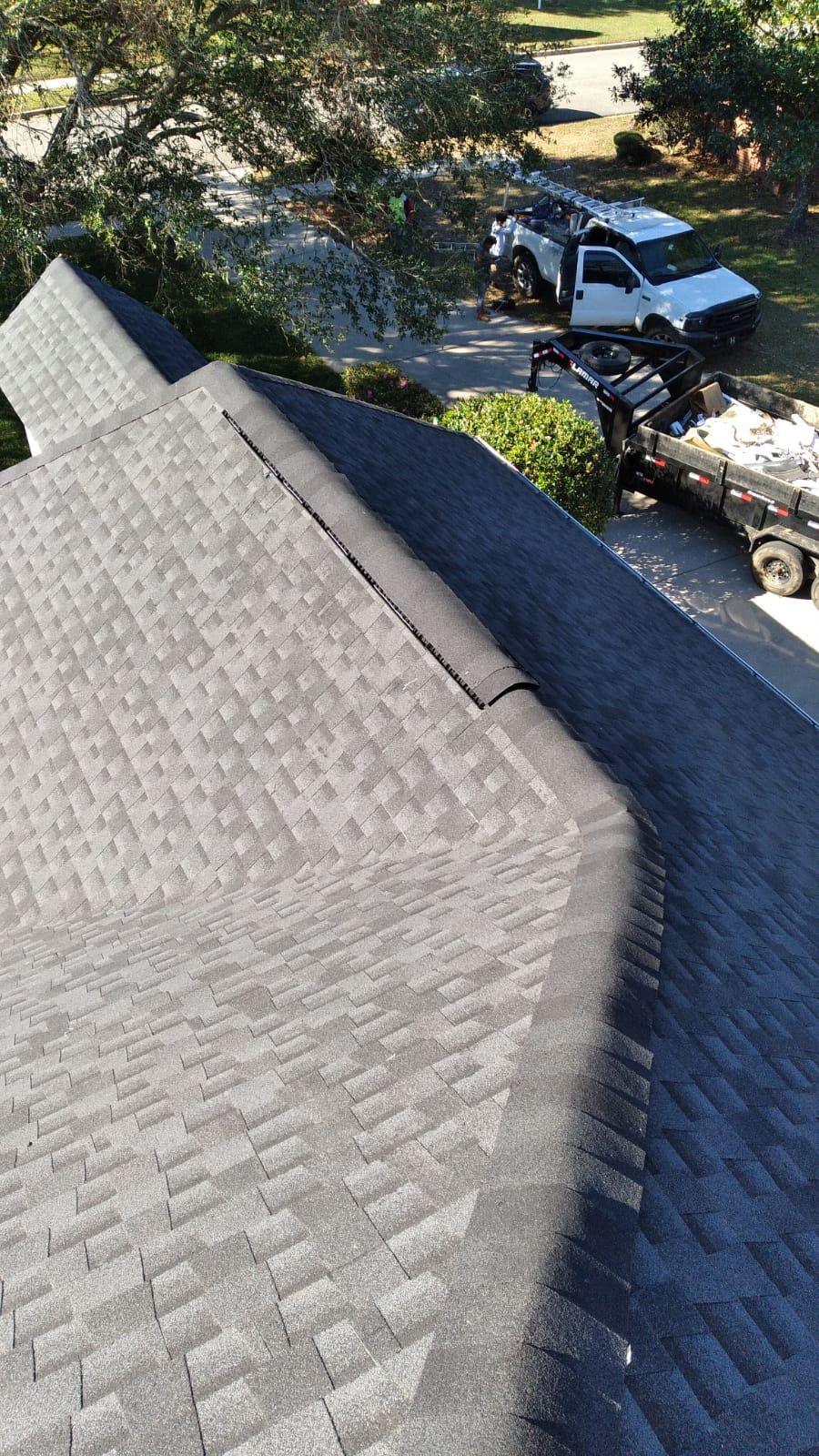 Residential Roofing Installation using Roof Replacement by American Roofing & Construction LLC