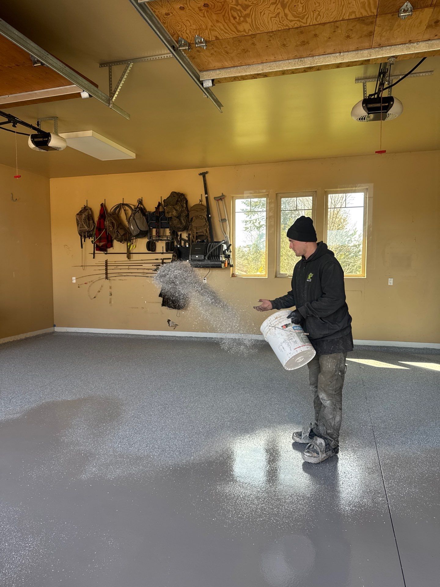 Turquoise Hybrid Polyaspartic Garage Floor Coating in Sandpoint by Croc Coatings, LLC