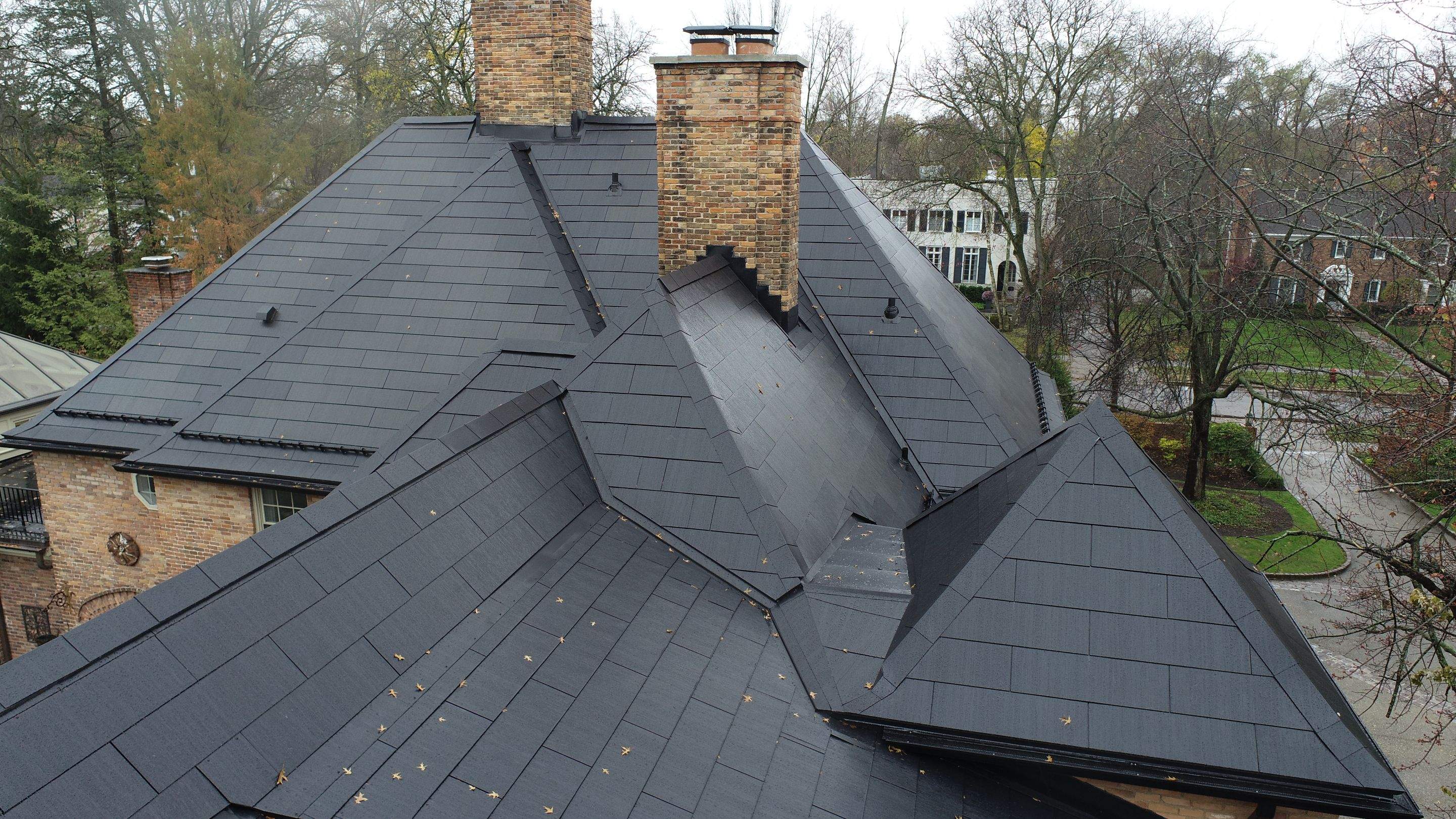 Tesla Solar Roof Replacement  by American Home Contractors