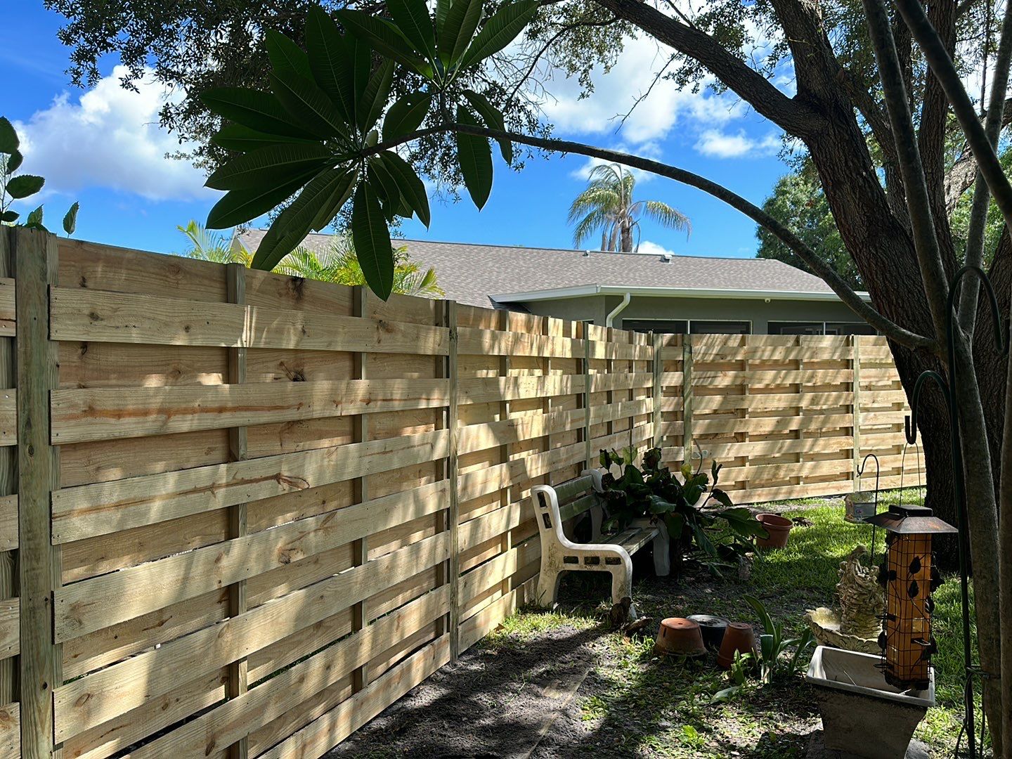 Wood Fence Installation using Horizontal Shadowbox Wood Privacy Fence by Asap fence and gates, LLC