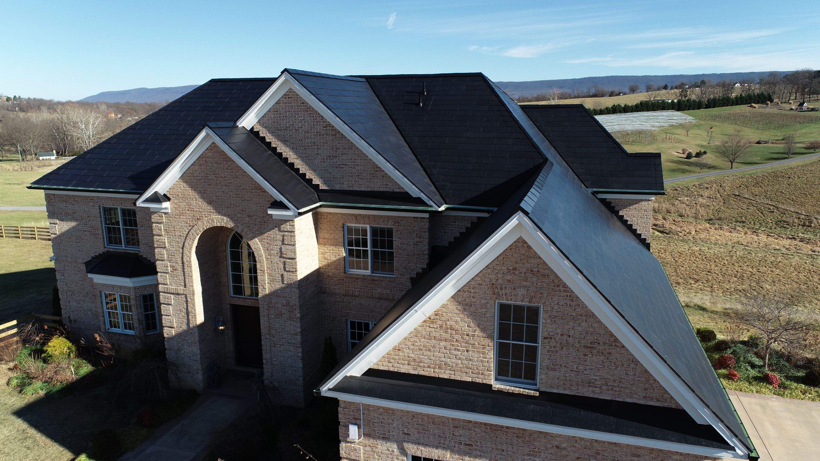 Tesla Solar Roof Replacement  by American Home Contractors