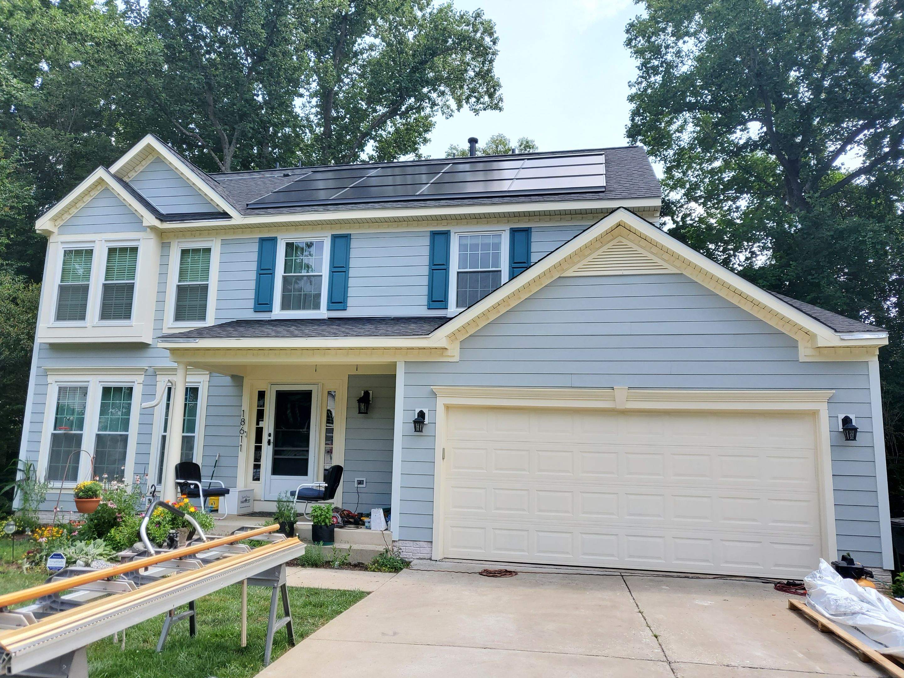 Exterior Home Makeover using GAF Timberline HDZ, GAF Decotech, and James Hardie Siding by American Home Contractors