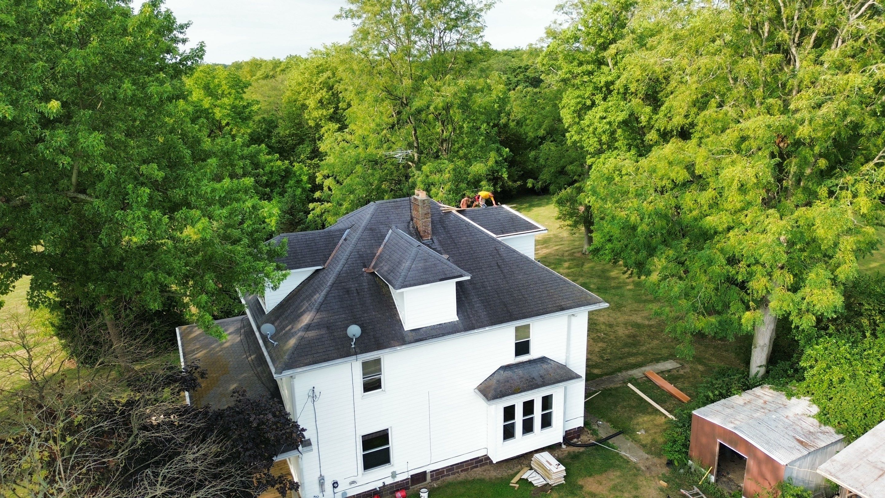 Residential Roofing Installation using Performance Panel Metal - Copper Metallic by RoofX 