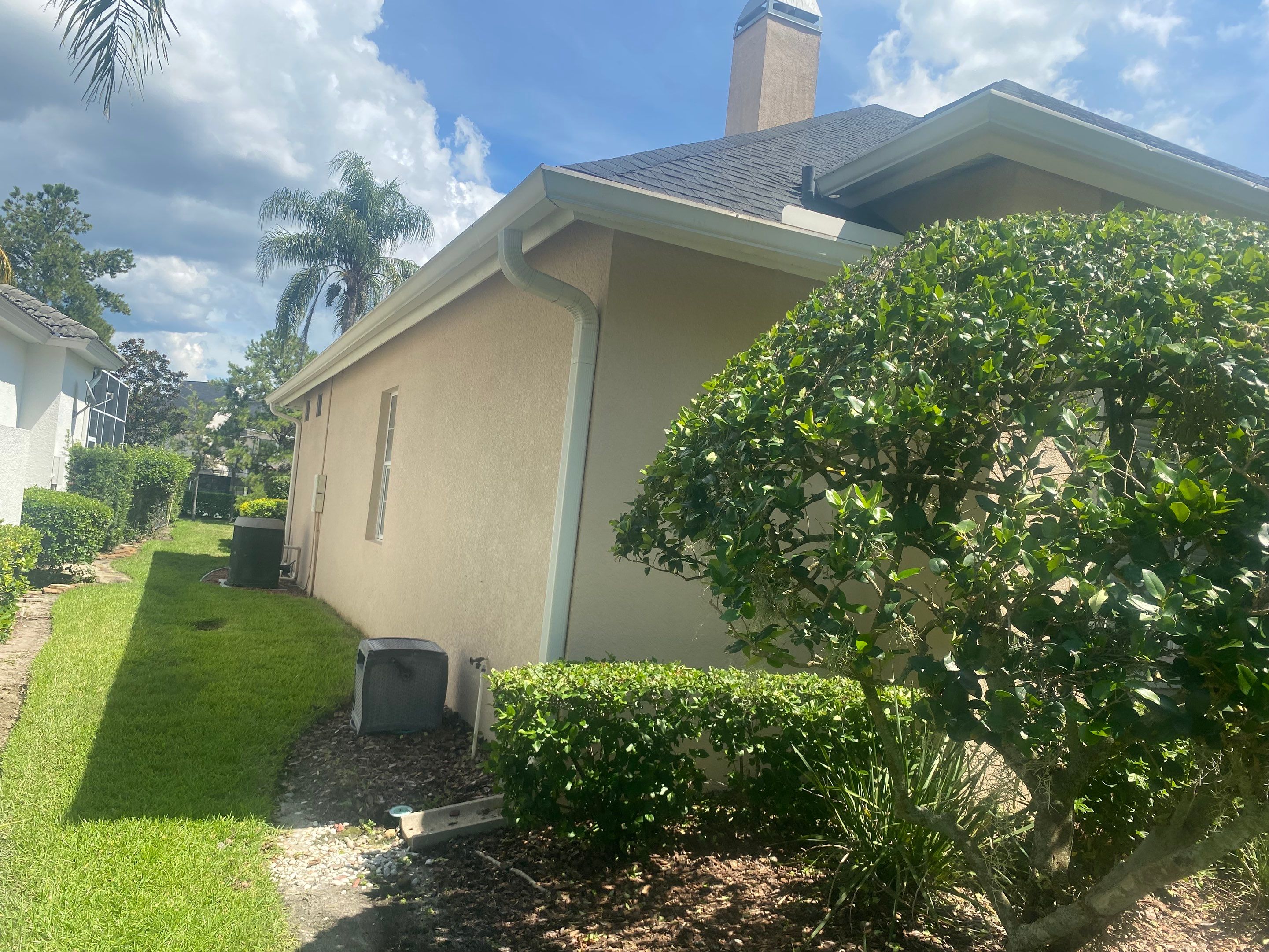 White Gutters and White Downspouts by Gutter Professors