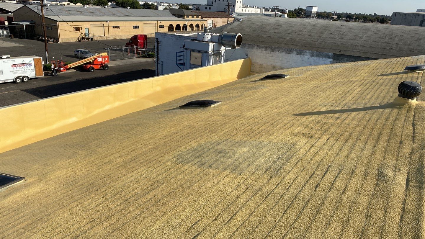 Spray foam and coatings using Polyurethane spray foam by Straight Edge Roofing Inc