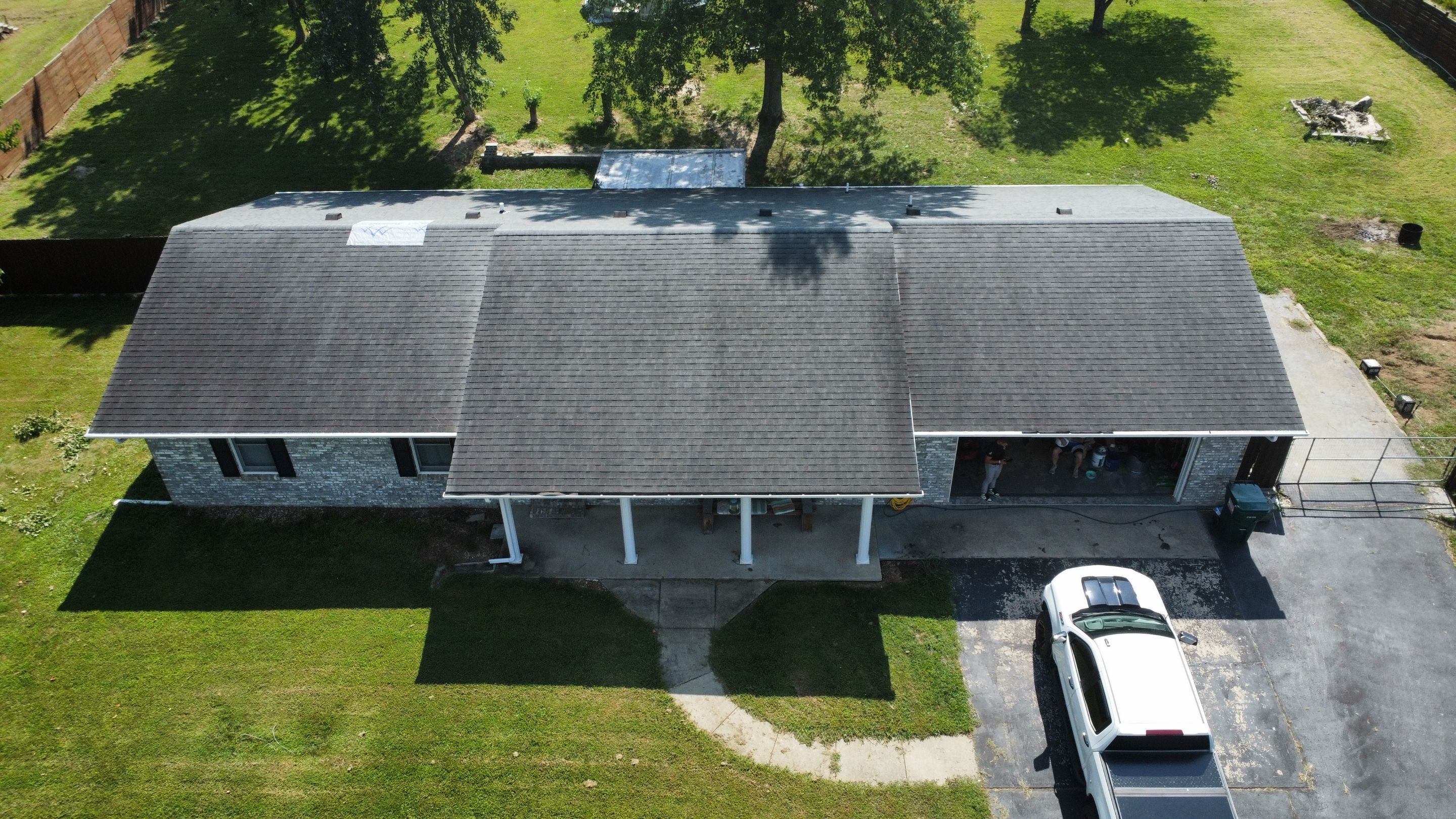 Residential Roofing & Downspouts Install  by Titan Commercial & Residential Roofing 