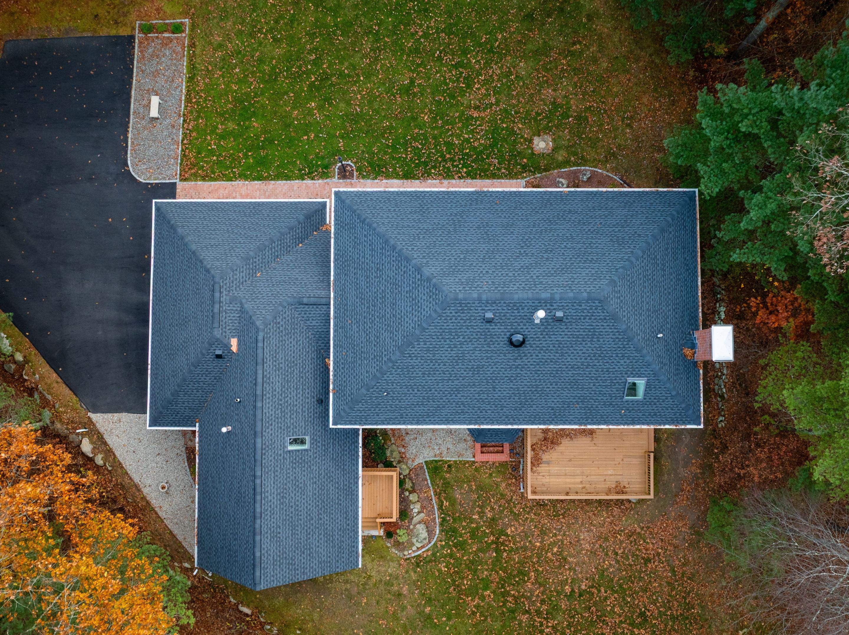 High Hawk - Architectural Shingles, Copper Brick Flashing, Skylights by Rinaldi Brothers