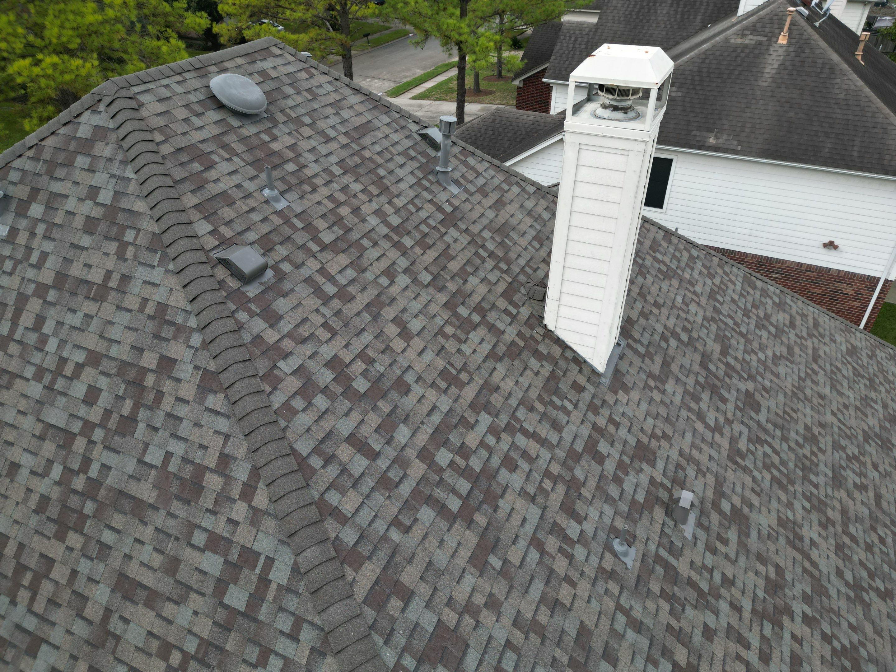 OC Duration Driftwood by HHH Roofing & Construction