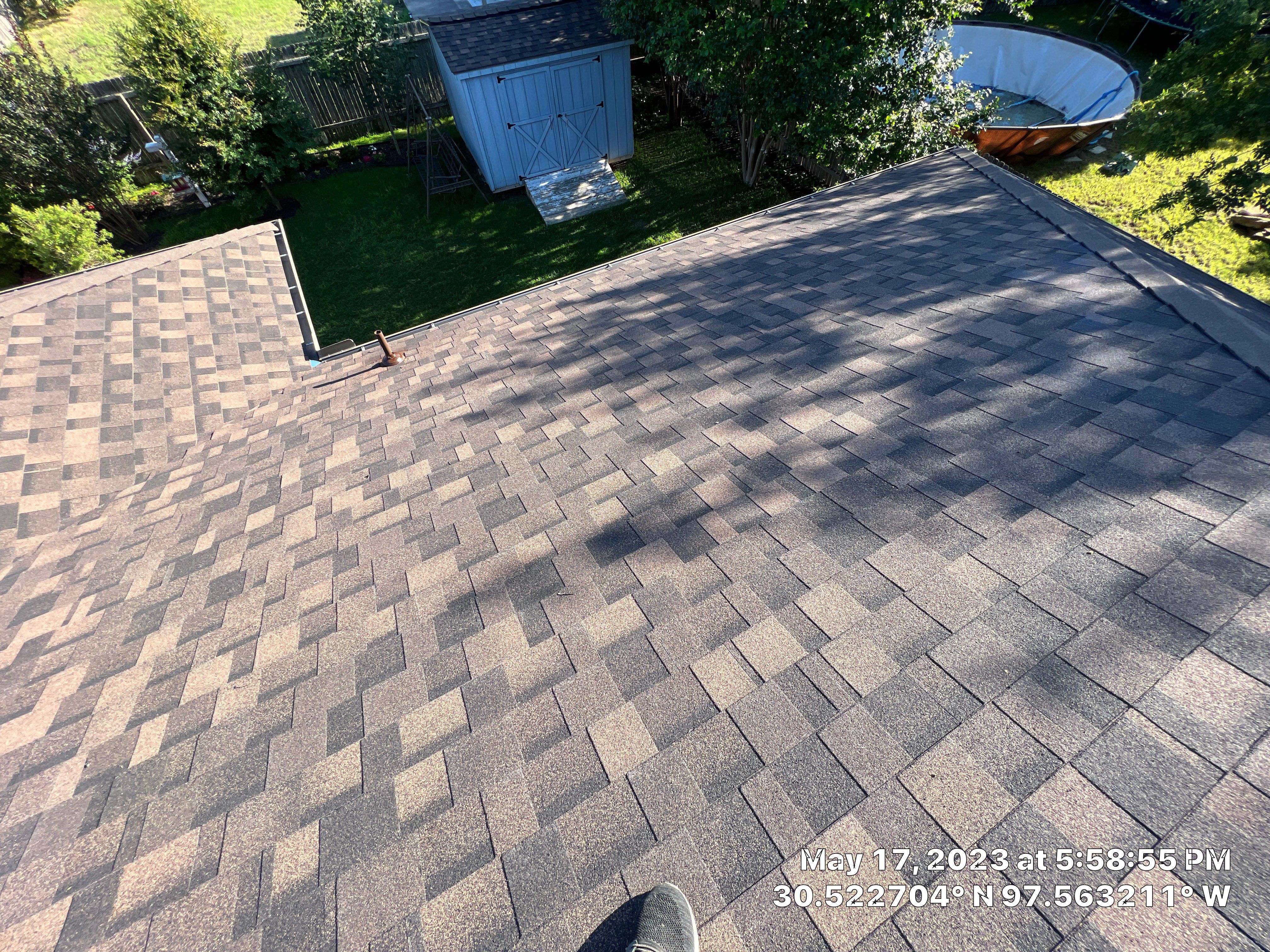 Residential Roof Replacement and Gutter System Upgrade in Hutto by Caliber Restoration LLC