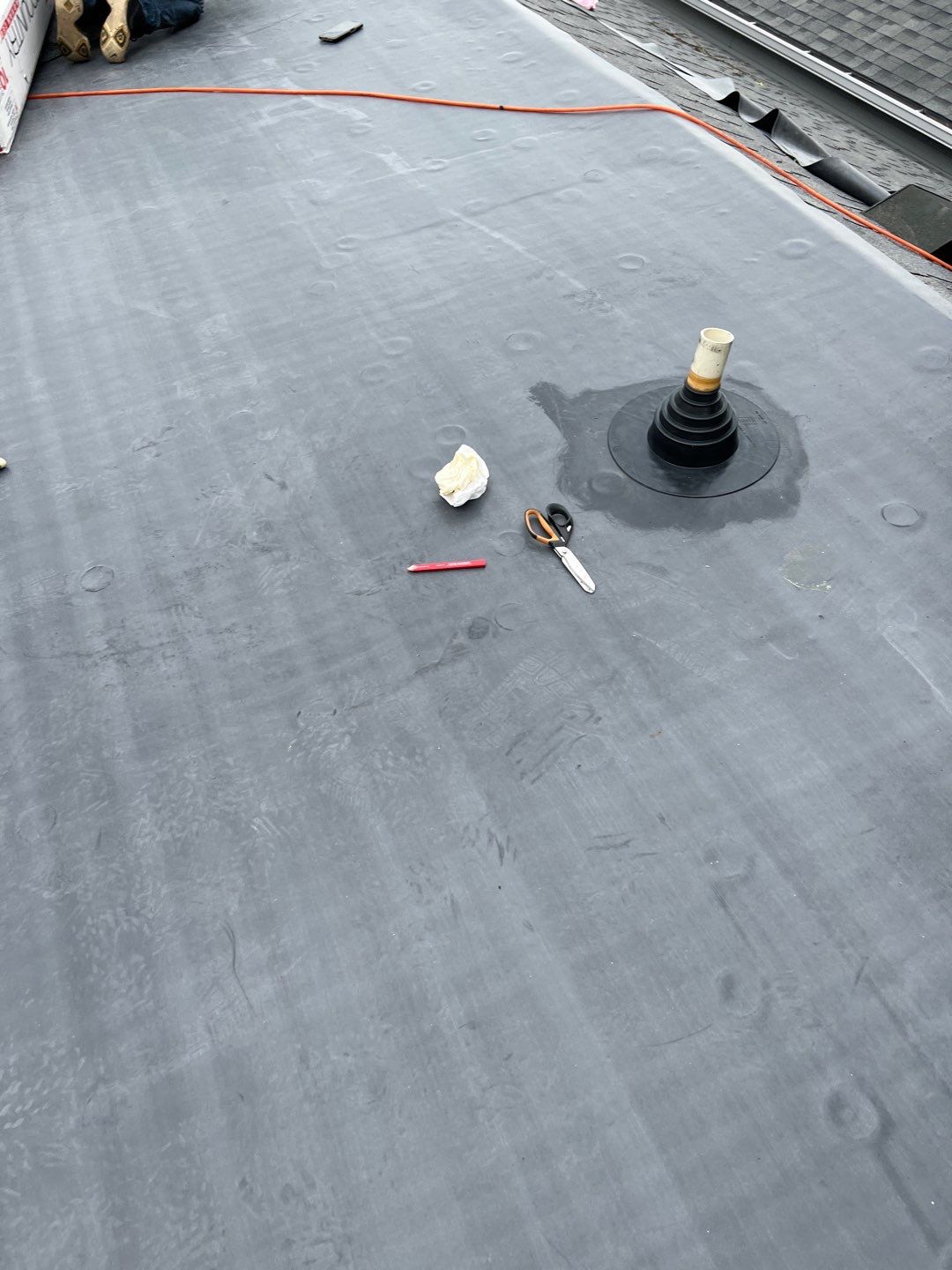 Residential Roofing Installation using 60 mil rubber roof  by Nitro Roofing and Construction