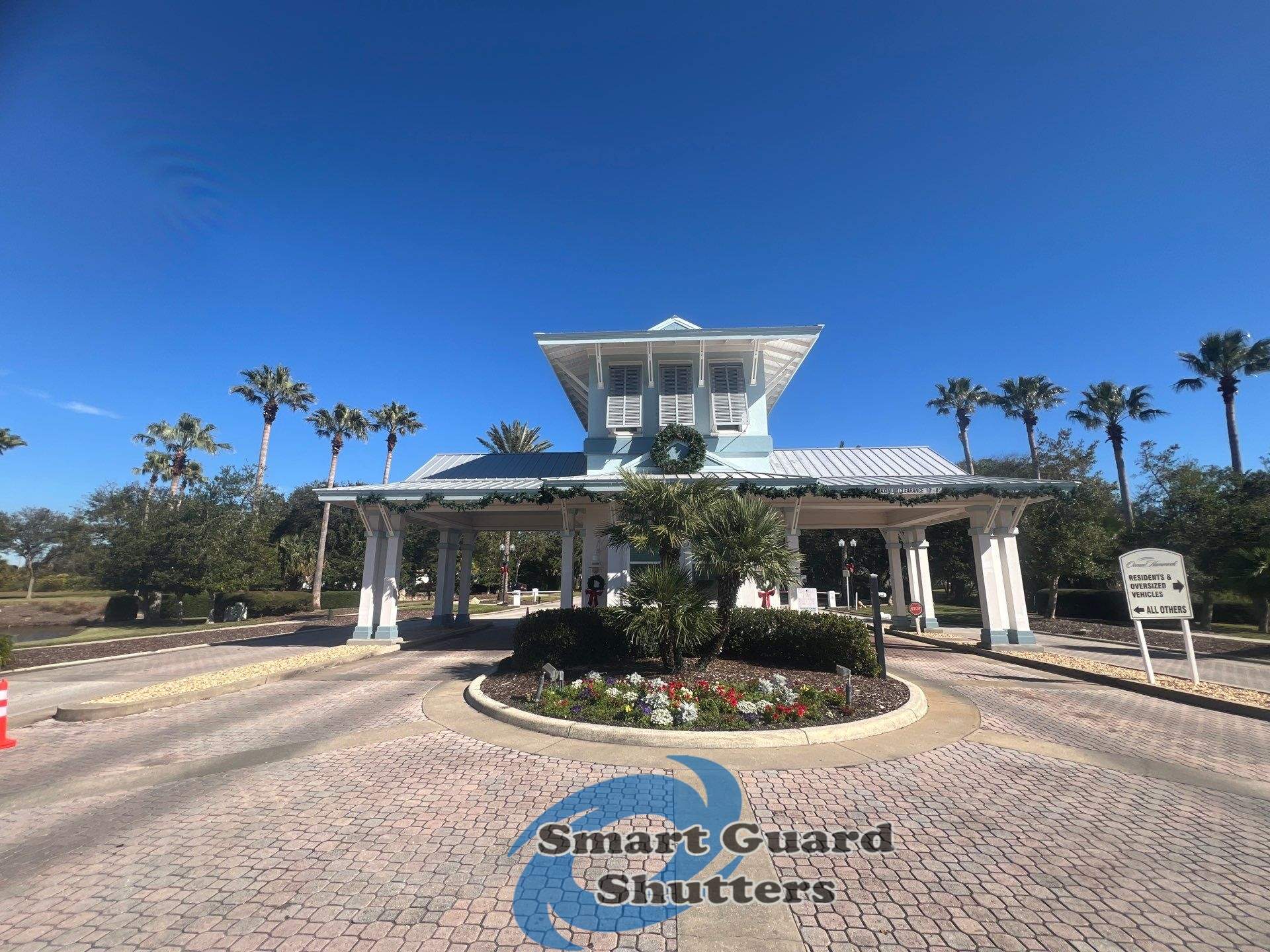 Decorative Bahama Shutters in Window Grey by Smart Guard Shutters