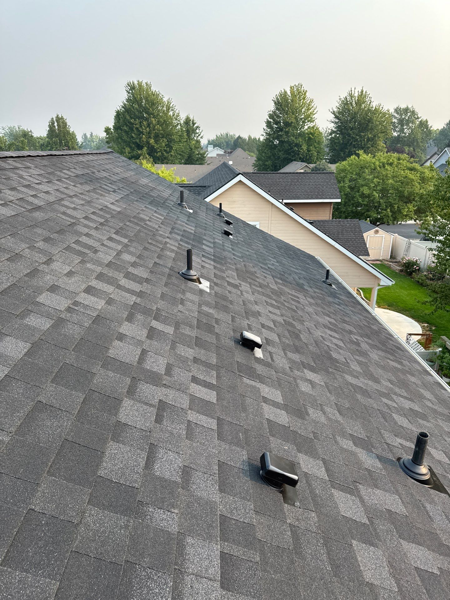 Meridian Residential Roof Replacement Using Dark Gray Architectural Shingles by Olive Roofing