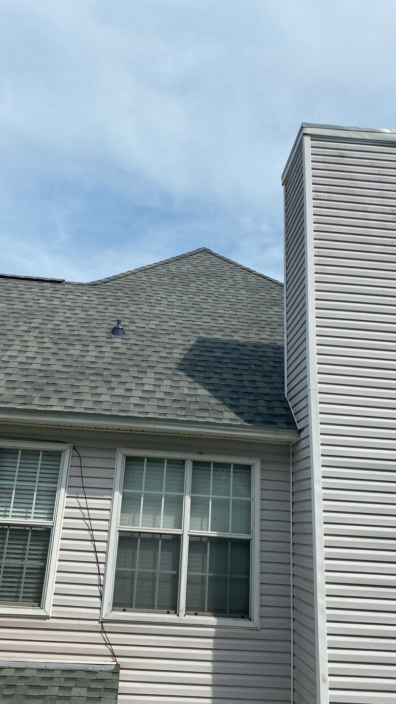 Residential Roofing Installation using Roof Replacement by American Roofing & Construction LLC