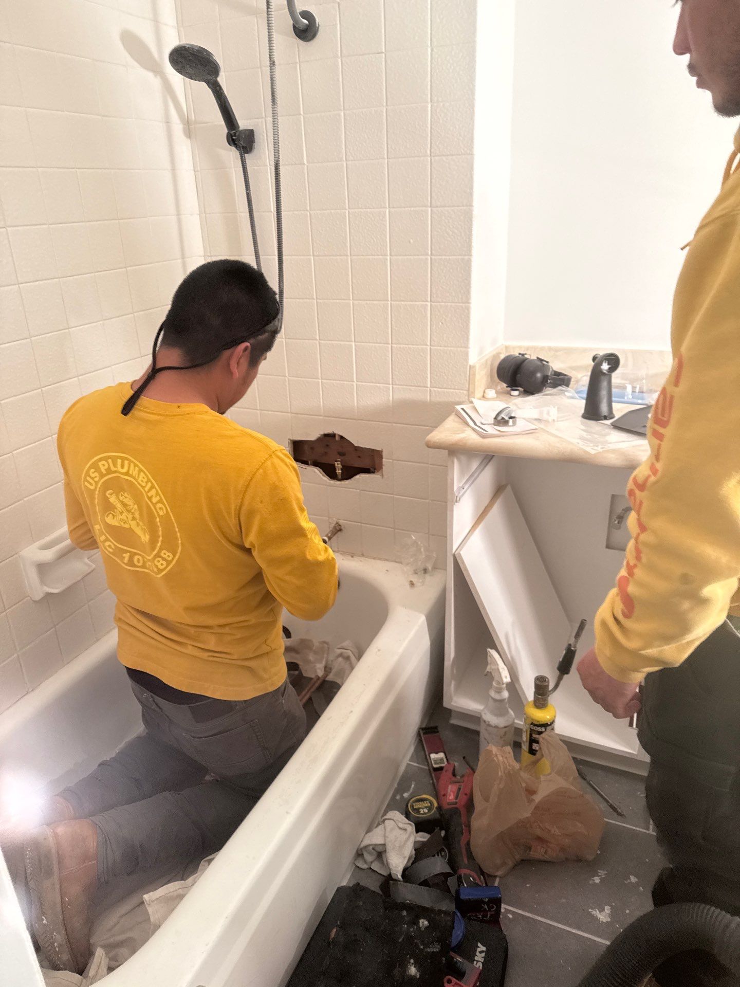 Installing Shower Fixtures  by Us Plumbing 