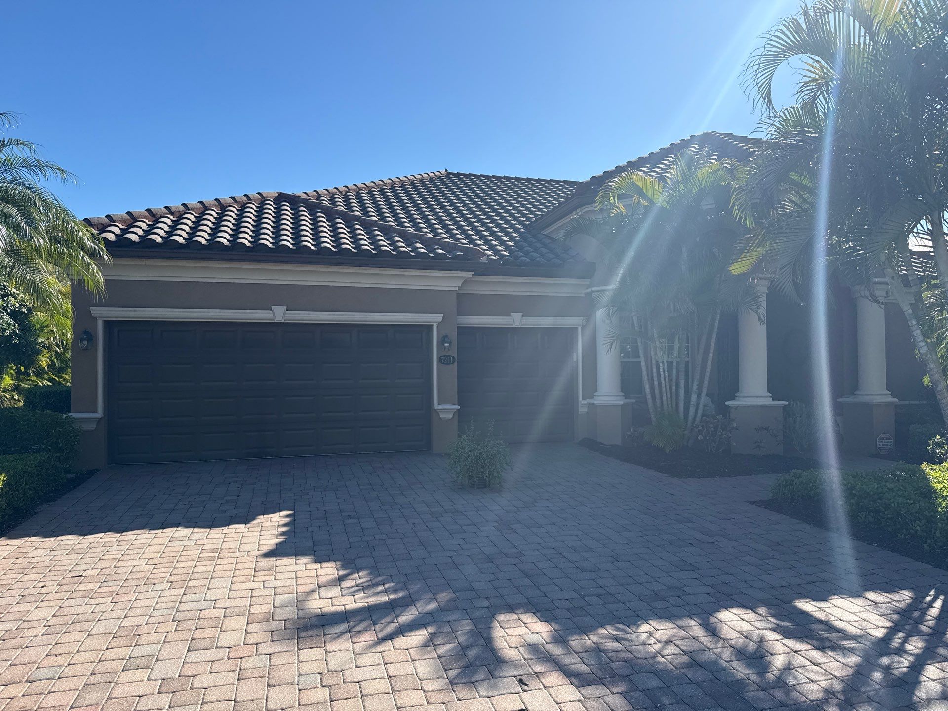 This project focused on a full gutter clean-out to restore proper water flow and prevent overflow issues.  Our scope of work included: 	•	Removing heavy leaf and pollen buildup from the gutter system 	•	Clearing out clogged sections along the rear gutters near the pool cage, where debris tends to accumulate more heavily 	•	Inspecting and cleaning the front gutter guards, which had several blocked areas restricting water flow 	•	Ensuring all downspouts and channels were flowing properly after service  Even with gutter guards installed, debris like pollen, shingle grit, and fine organic matter can still build up over time—especially in Florida’s environment. Regular maintenance helps prevent water damage, overflow, and staining on exterior surfaces.  Another thorough job completed by Sunshine AquaWash® – keeping homes protected from top to bottom. by Sunshine AquaWash