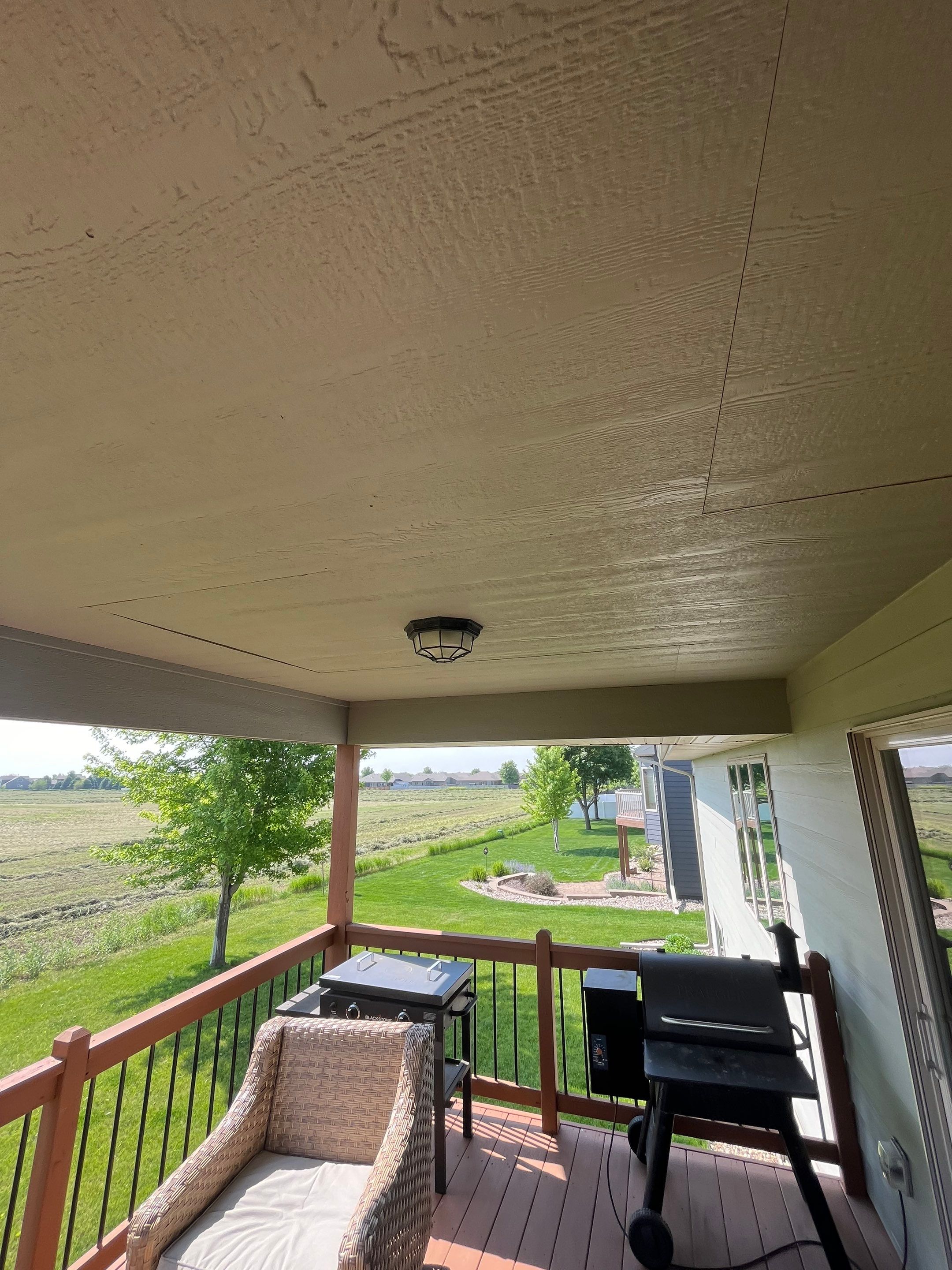 Sioux Falls Residential Exterior Refresh with Fiber Cement Siding by Select Painting, Coatings & Garage Cabinets