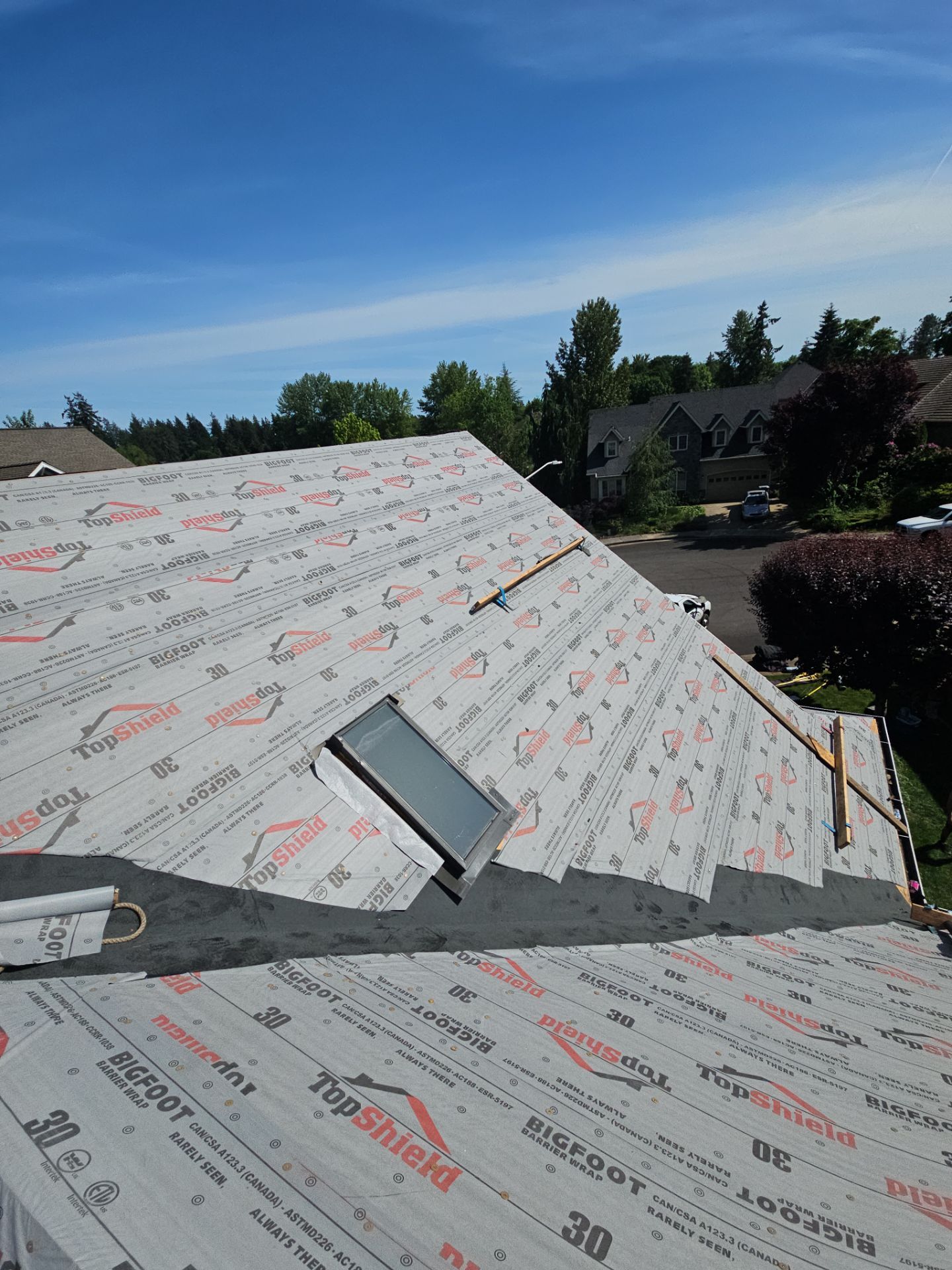 Residential Roofing Installation using Malarkey Vista (Color: Black Oak) by Orezona Building & Roofing Company, Inc.
