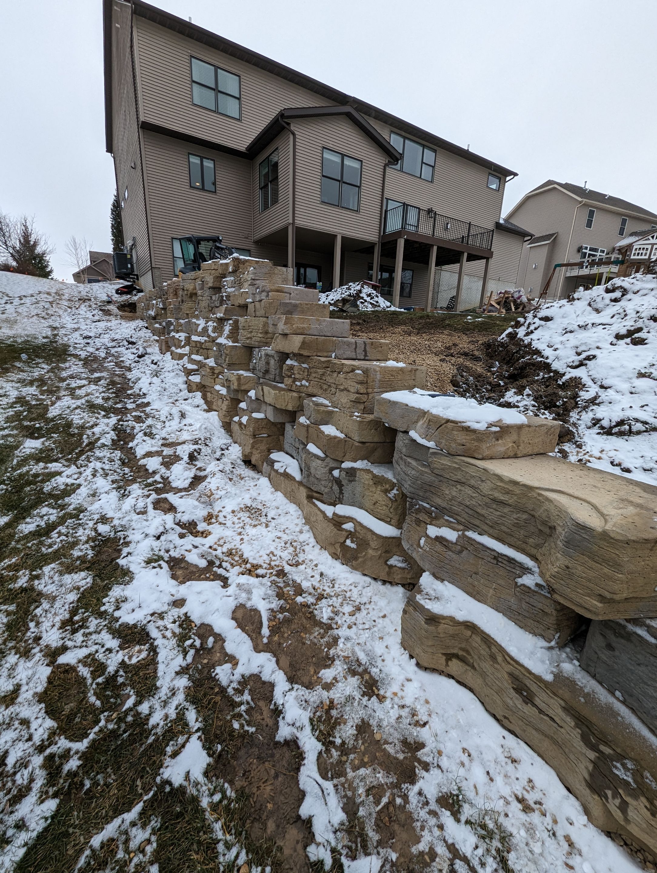 Retaining wall using Rosetta stone by ACE Waterproofing & Basement Solutions