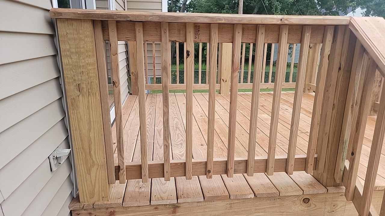 Deck Installation using Treated Lumber by Avalon Roofing and Exteriors