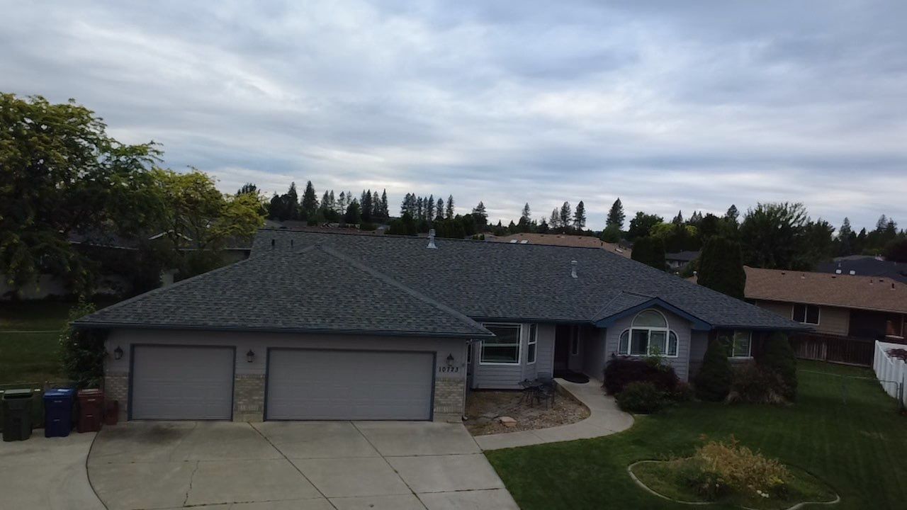 Spokane Residential Roof Replacement With Solar Panel and Skylight Integration N Portsmouth Ct Spokane, WA 99208  The Denali System - Certainteed Landmark® Shingle - Granite Gray by Alpine Roofing