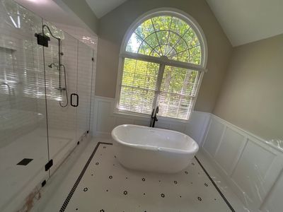 Suwanee Home Renovation With Granite Kitchen and Red Custom Deck