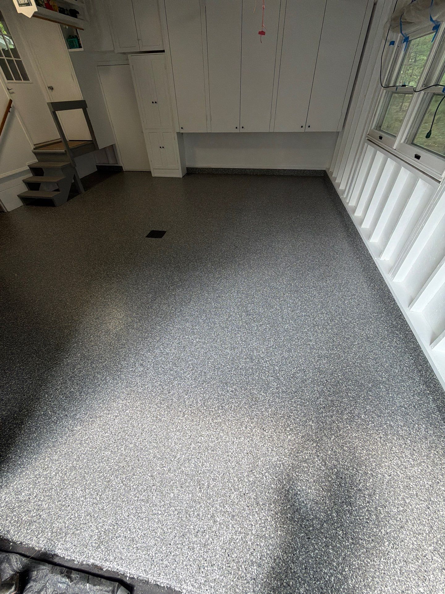 Pentwater Garage Epoxy Flake Floor Installation and Exterior Refinement by Gordon Painting
