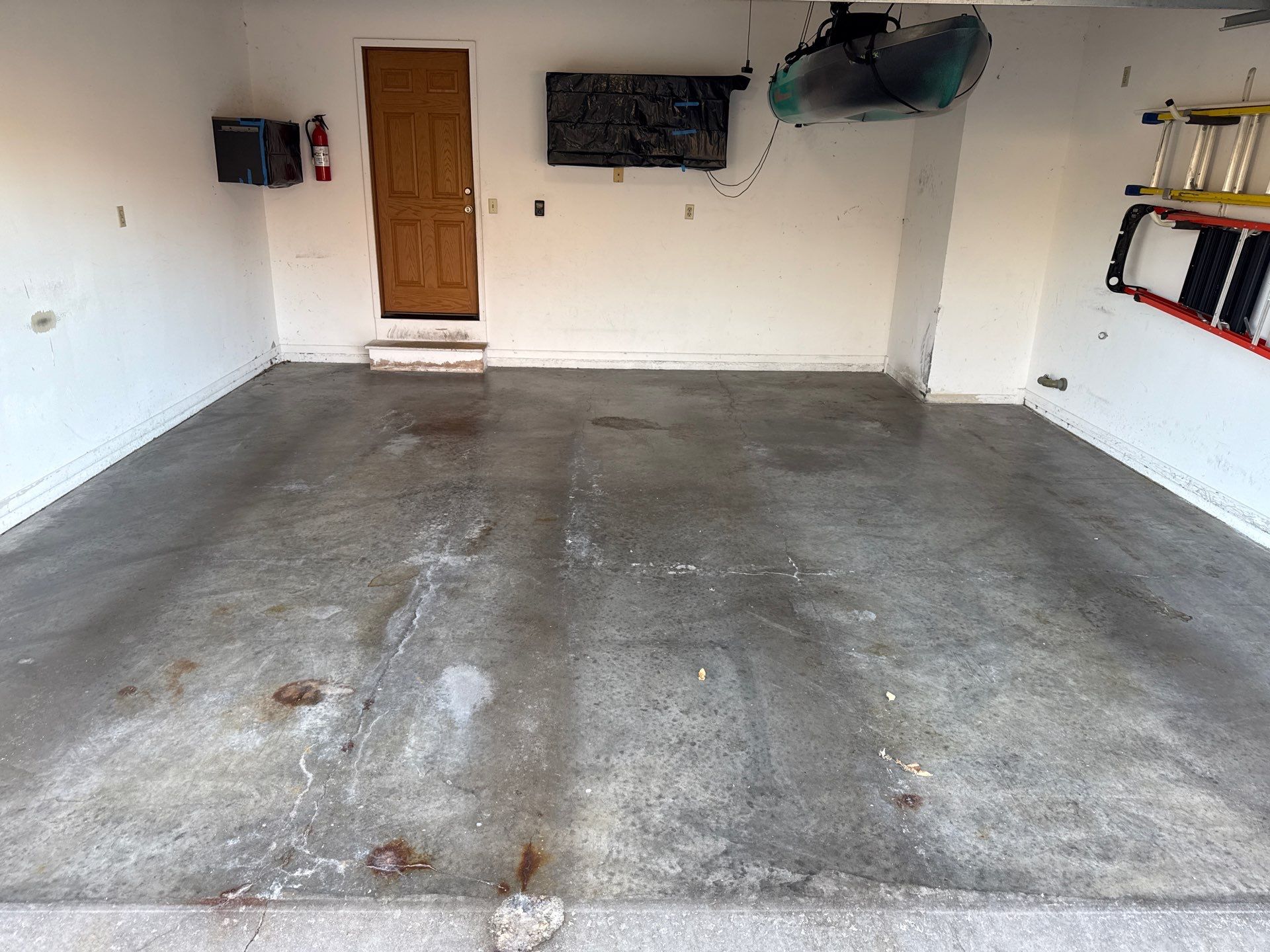 38 Year Old Garage Looking Brand New! by Revival Concrete Coatings, LLC