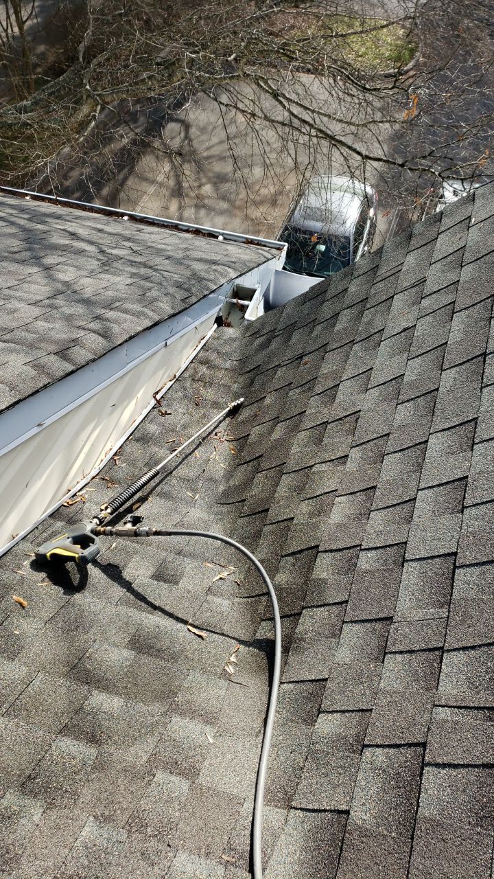 Gutter Cleaning using water by Power Wash Masters LLC