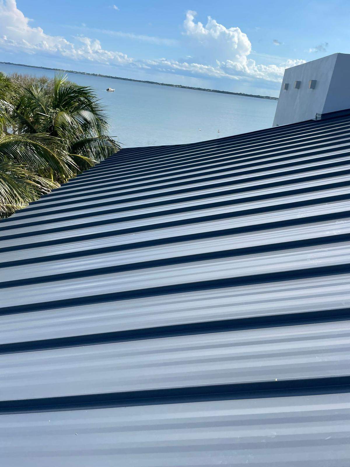 .032 Aluminum 1.5" Mechanical Seam Charcoal Gray by Total Roofing System The Metal Roof Experts