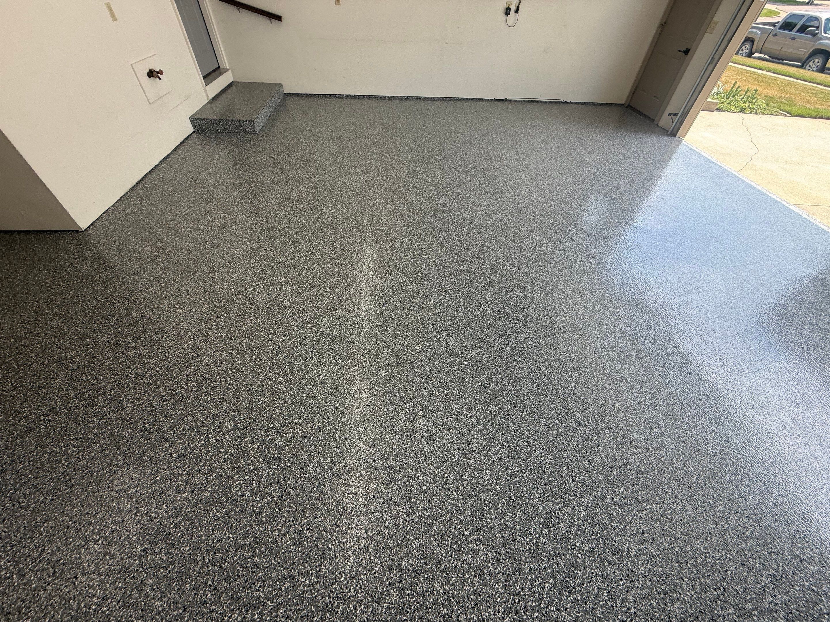 Smoke Flake Garage Floor Coating in Dell Rapids by Select Painting, Coatings & Garage Cabinets