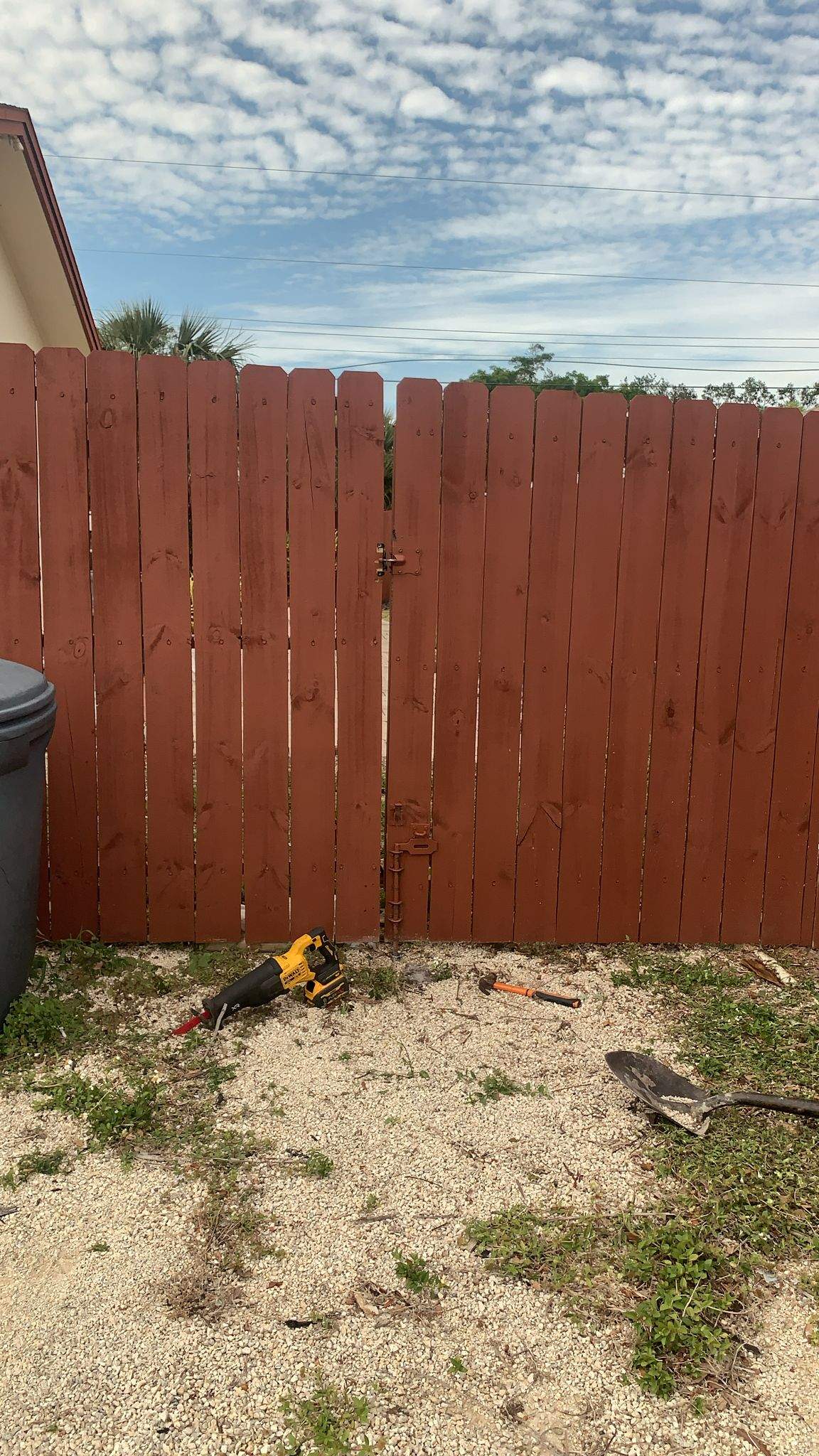 Red-Stained Wood Privacy Fence and Gate Repair in Venice by True Fence LLC