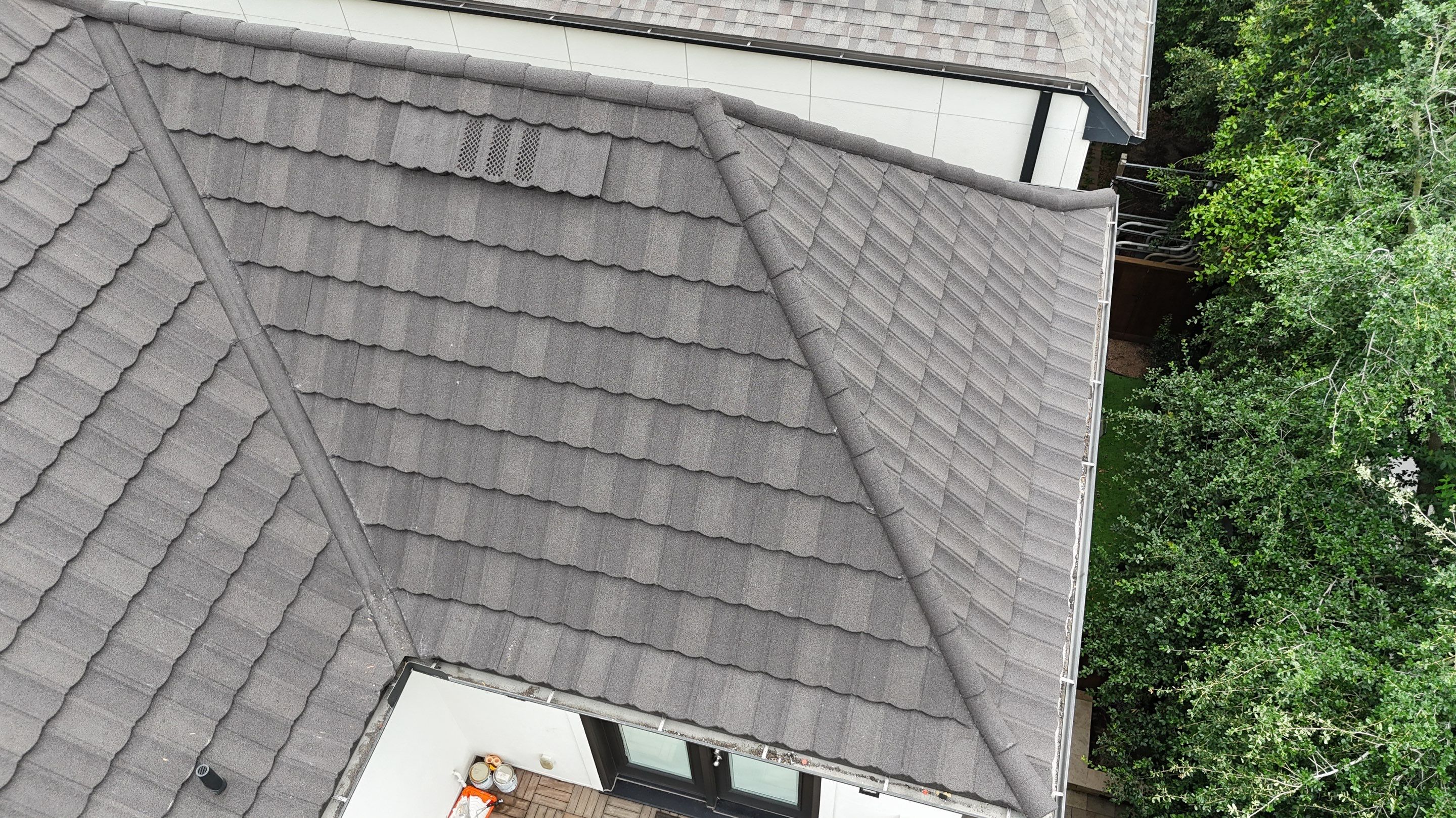 Stunning transformation from Shingles to DECRA Tile by Core Four Roofing