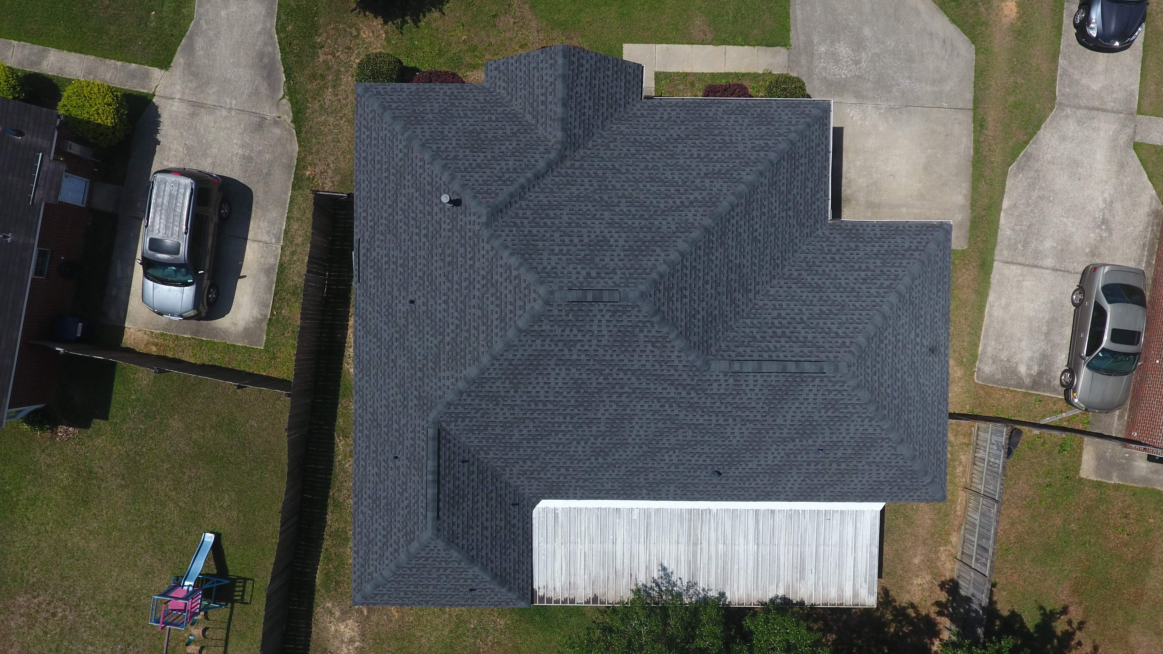 Residential Roofing Installation using Roof Replacement by American Roofing & Construction LLC