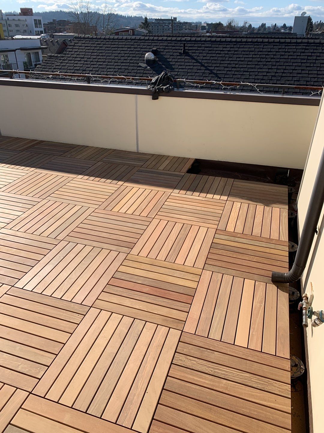 Ballard Rooftop Deck using IPE Tiles by Alki deck builders