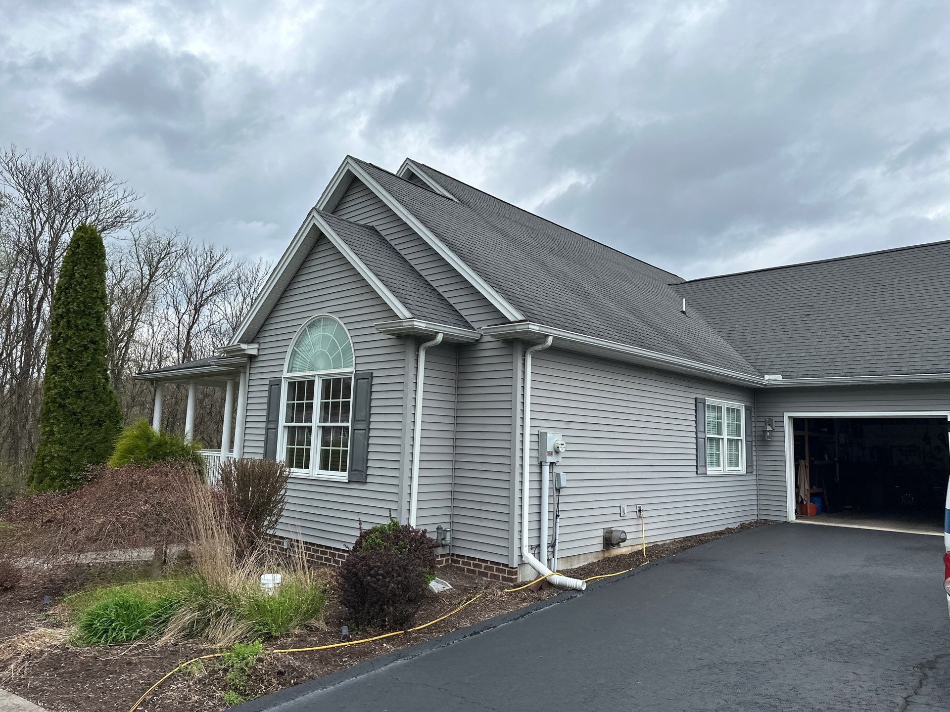 Full Vinyl Siding Replacement and Shingle Roof Install in Millersburg by Esh Builders